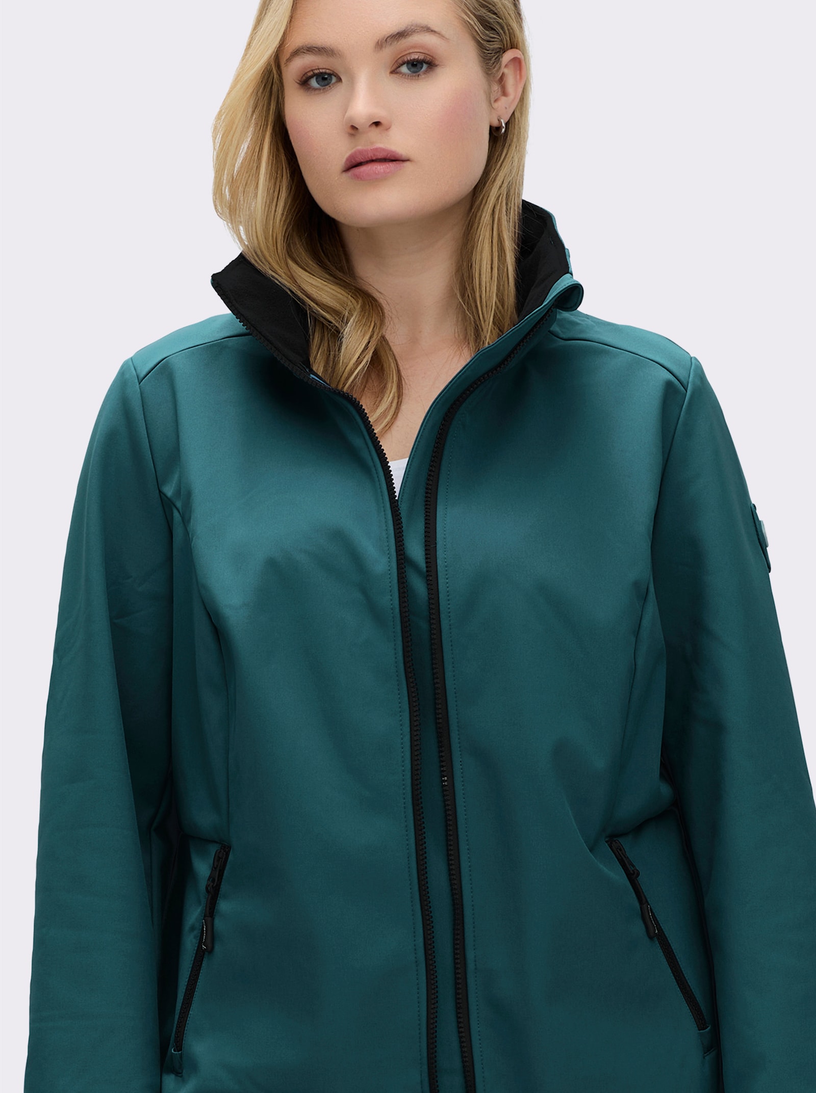 Softshelljacke mit Gummizug im Rücken - petrol