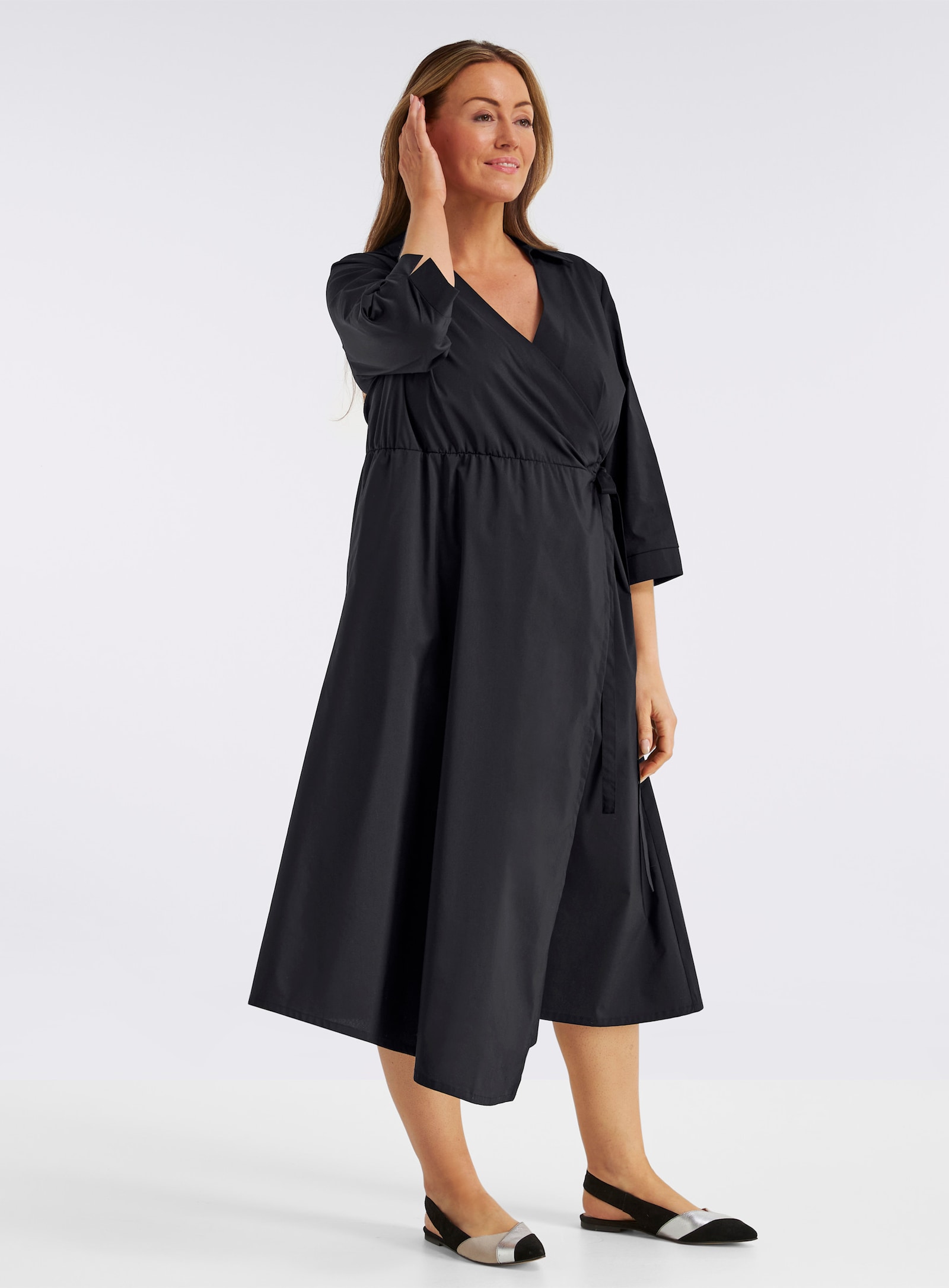 sheego Wickelkleid mit asymmetrischem Saum - schwarz