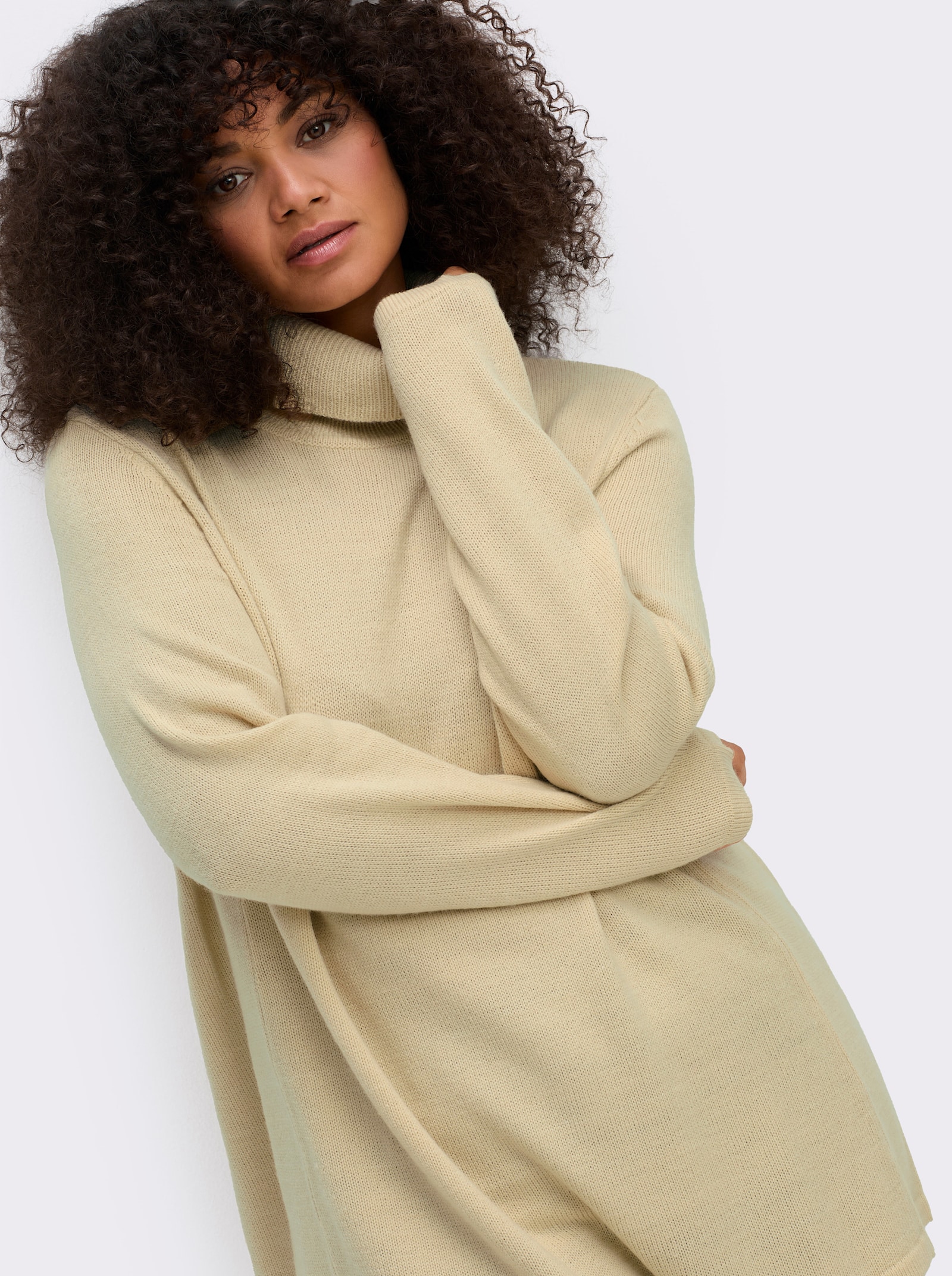 sheego Rollkragenpullover in A-Linie - sand