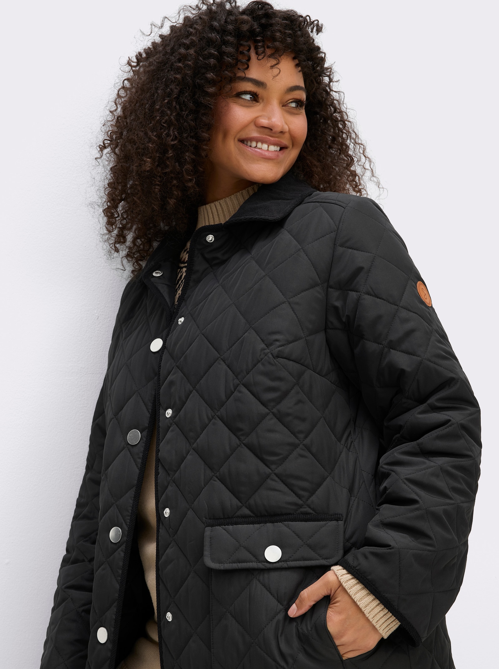 sheego Steppjacke mit Cord-Akzenten - schwarz