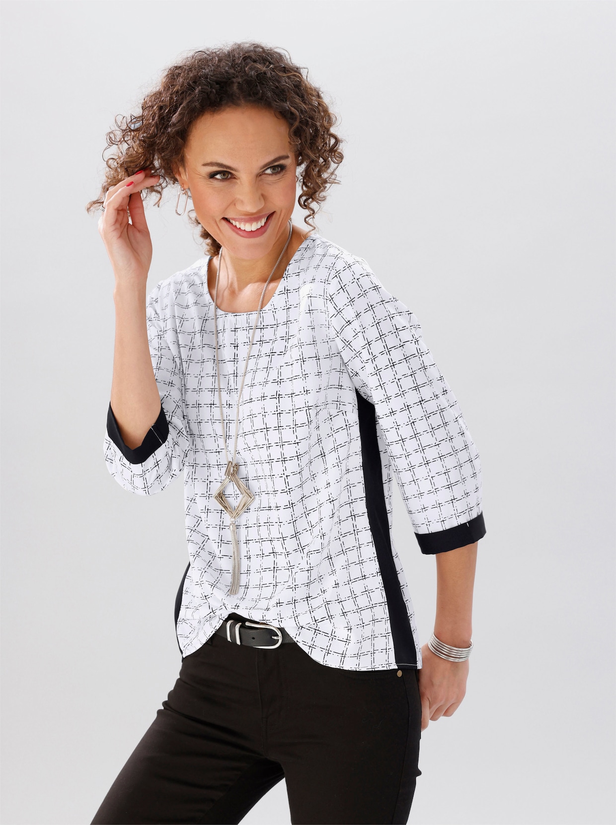 Comfortabele blouse - wit/zwart gedessineerd