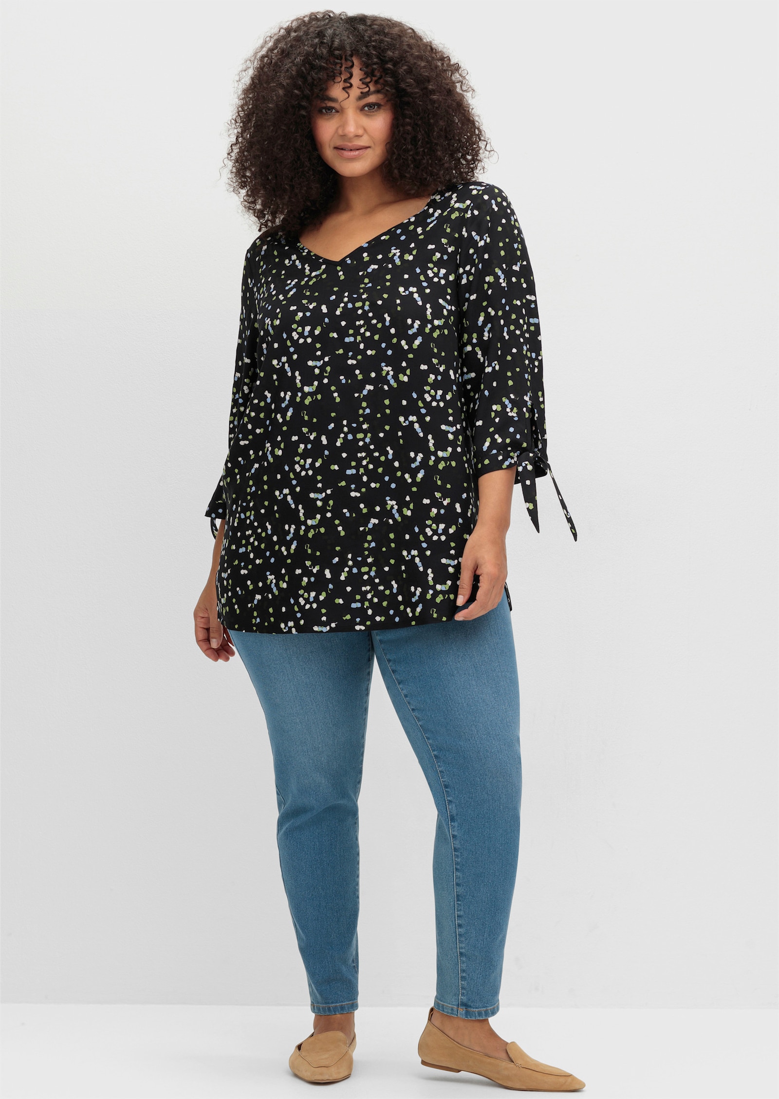 sheego Tunika mit Bindeband am Ärmel - schwarz-gemustert