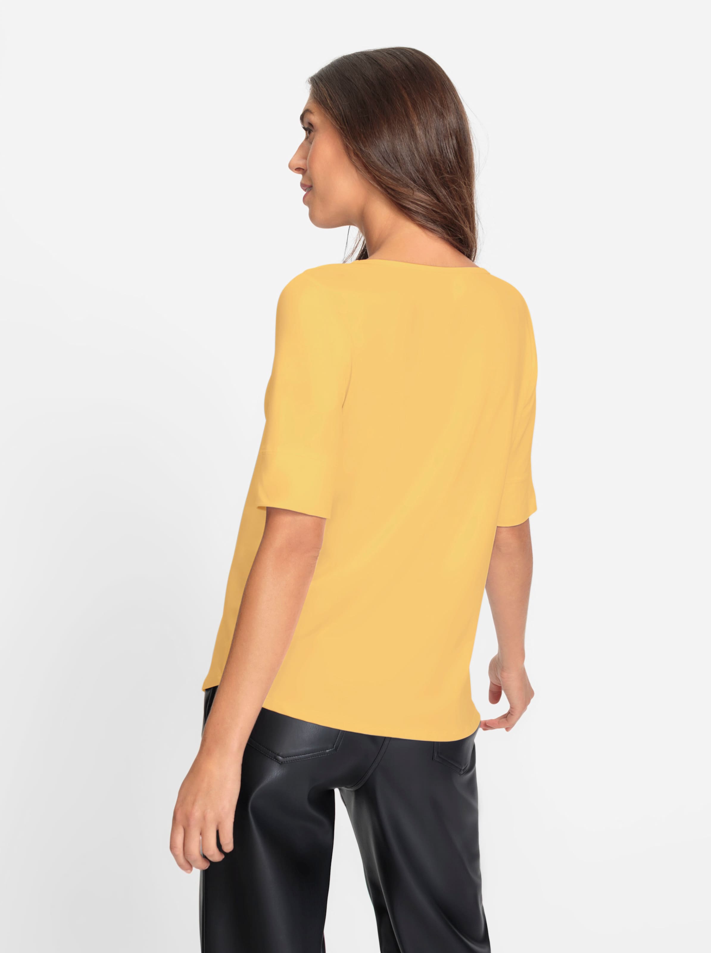 Mini DC günstig Kaufen-Shirt in gelb von heine. Shirt in gelb von heine <![CDATA[Shirt Aus angenehmer knitterarmen Tactel-Qualität. Femininer weiter Rundhals-Ausschnitt. Leicht tailliert mit etwas längerem Halbarm. Bequeme Bündchen an den Ärmeln.]]>. 