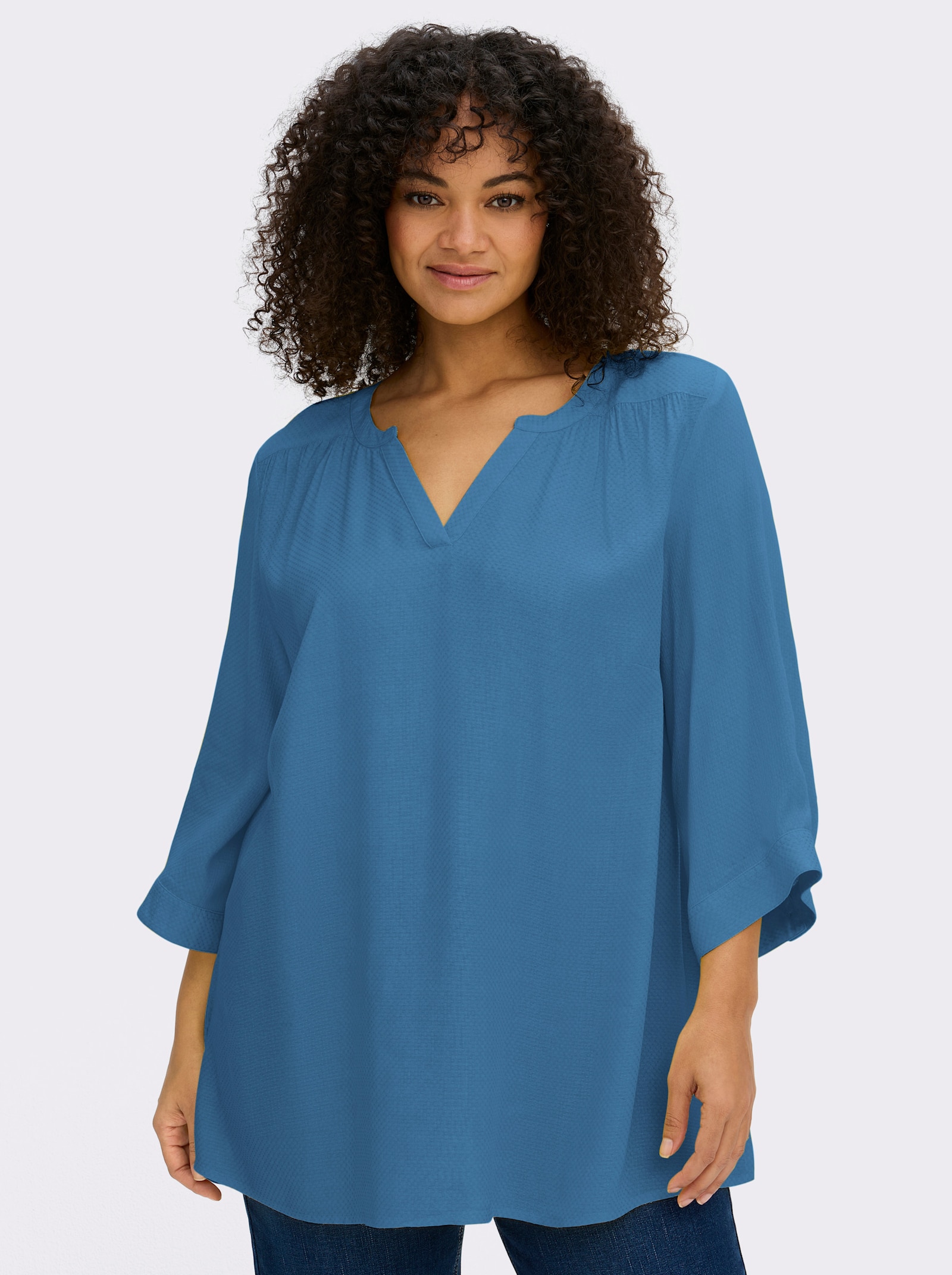 sheego Tunika mit Rundhalsausschnitt und V-Schlitz - topas