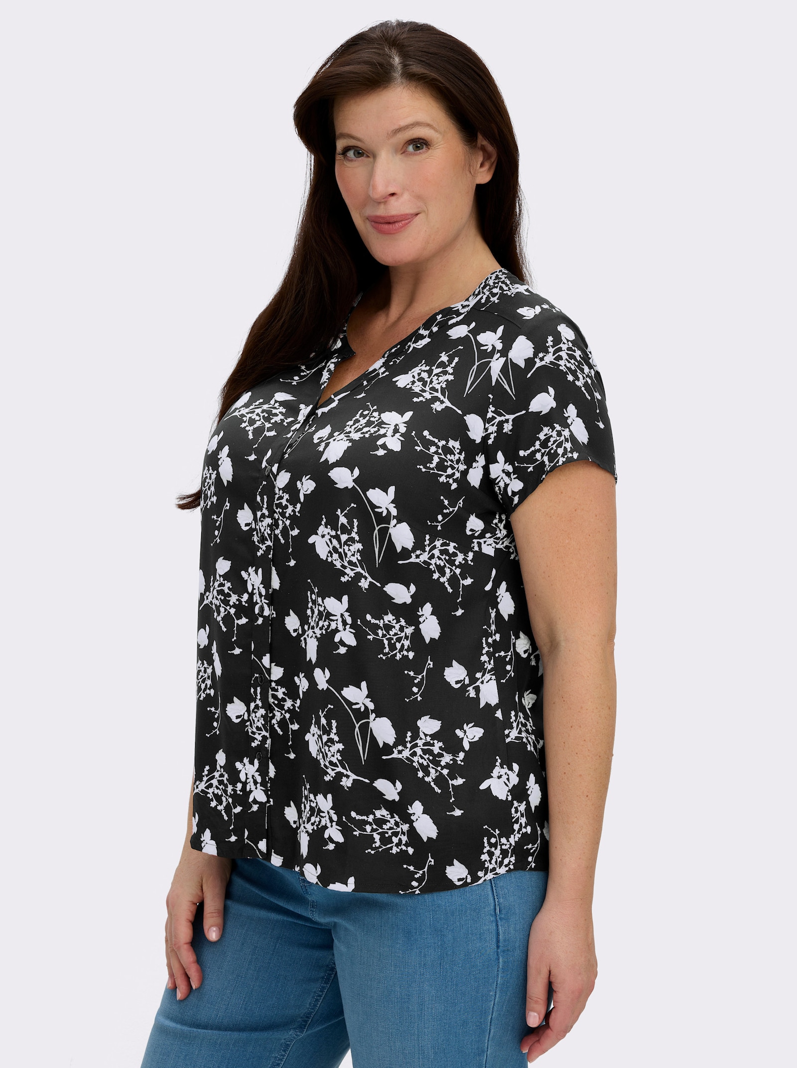 Kurzarm-Bluse mit floralem Druck - schwarz-weiß-gemustert