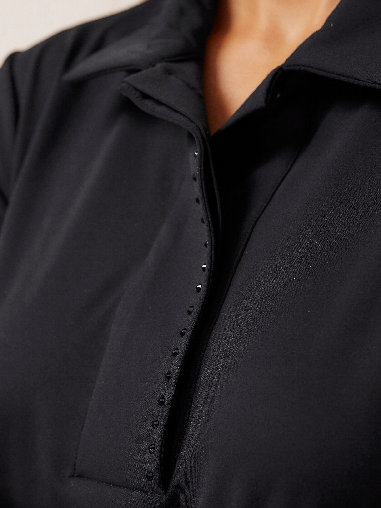 heine Jerseyjurk met glittersteentjes - zwart