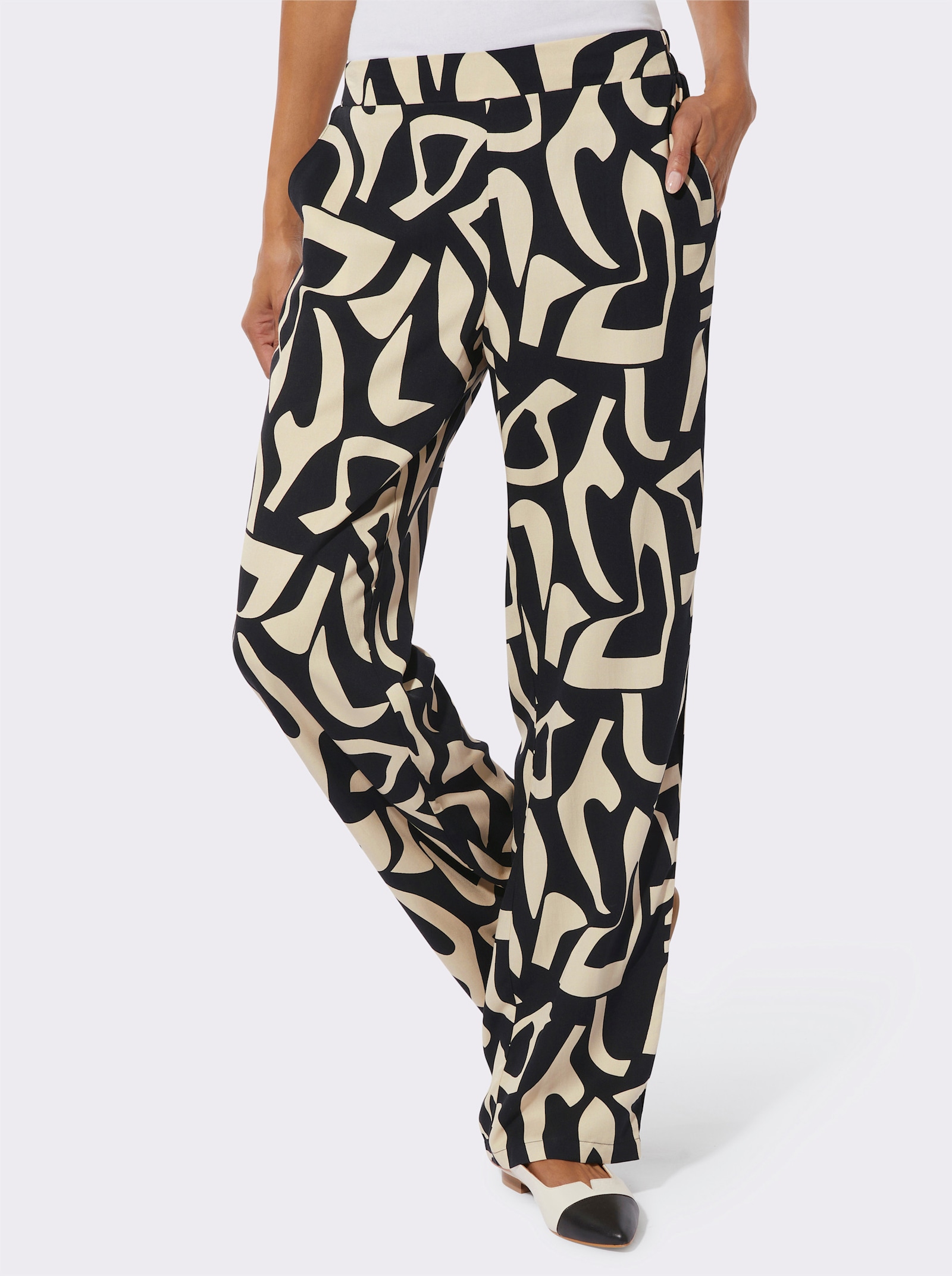 Schlupfhose mit seitlichen Taschen - sand-schwarz-bedruckt