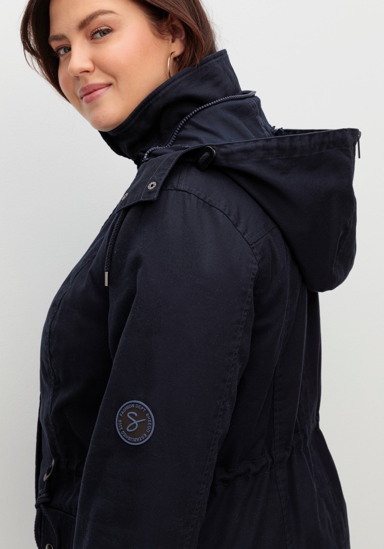 sheego Parka mit Taillen-Gummizug, warm wattiert - nachtblau