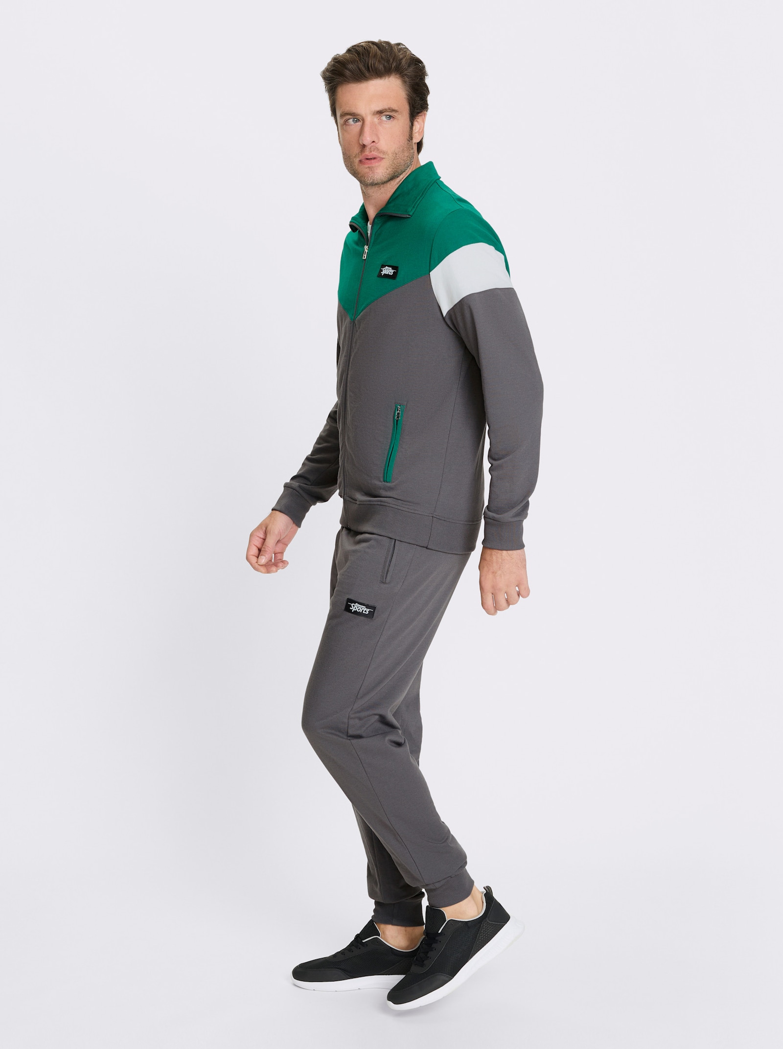 Catamaran Sports Freizeitanzug mit Reißverschluss-Taschen - grün