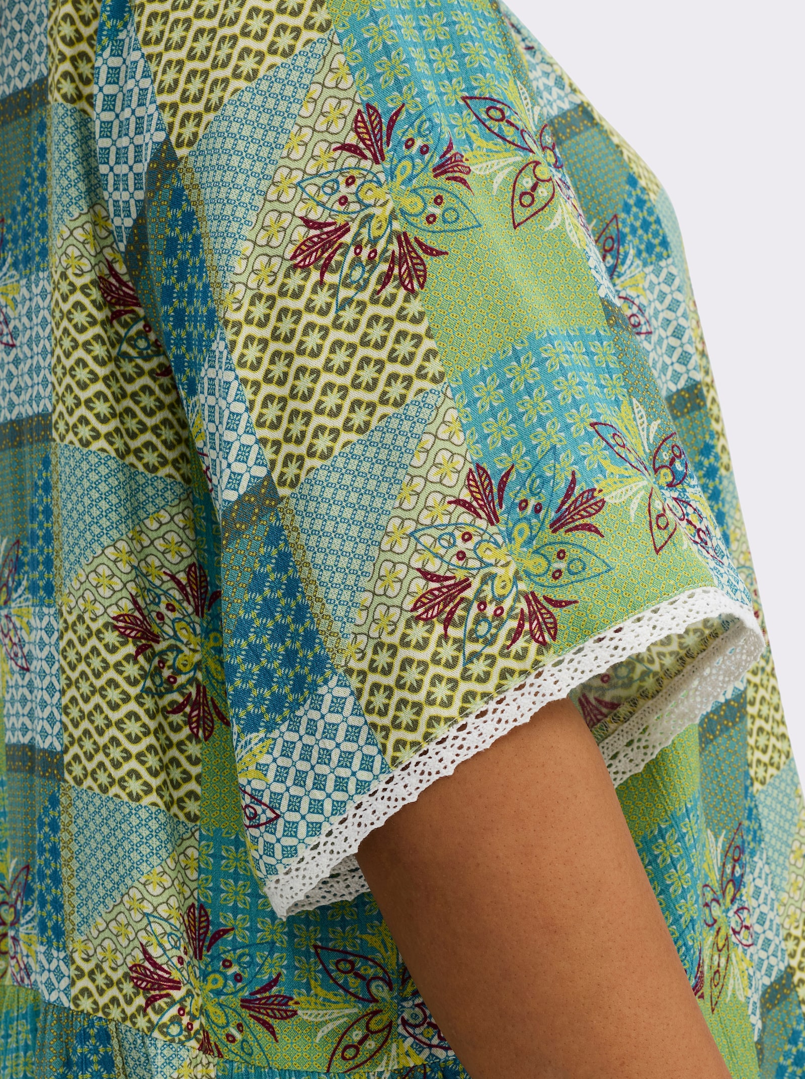 sheego Tunika mit Knopfleiste und Alloverdruck - ecru-pistazie-bedruckt