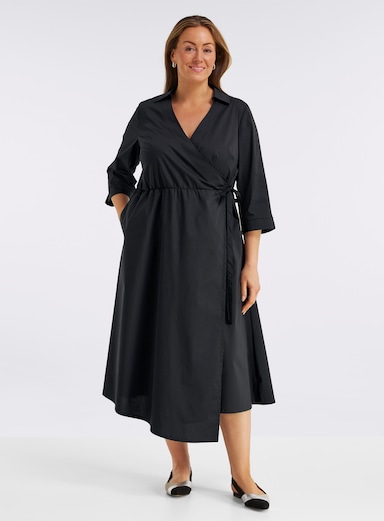 sheego Wickelkleid mit asymmetrischem Saum - schwarz