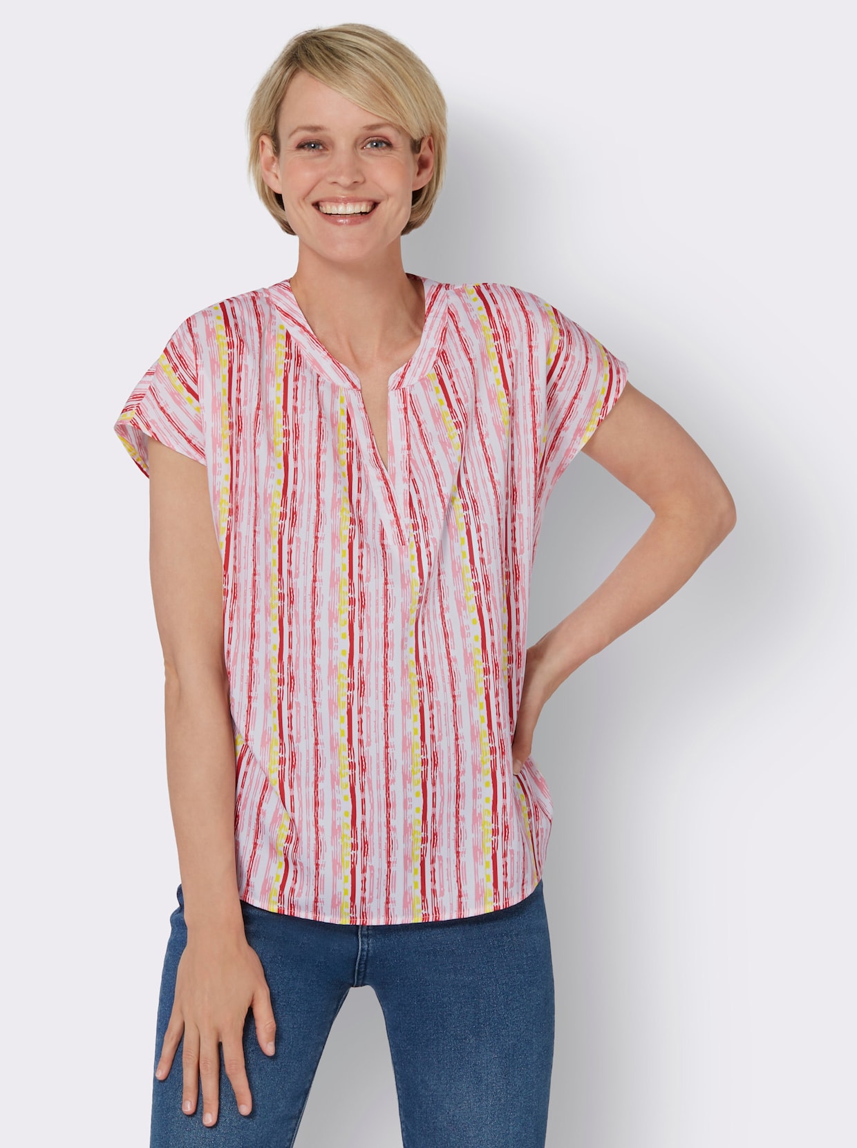 Comfortabele blouse - wit/koraal gestreept