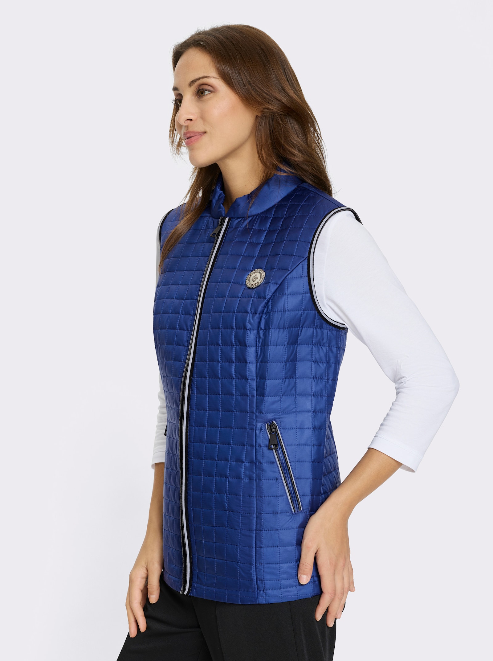 Prošívaná vesta s kontrastními paspulkami - královská modrá