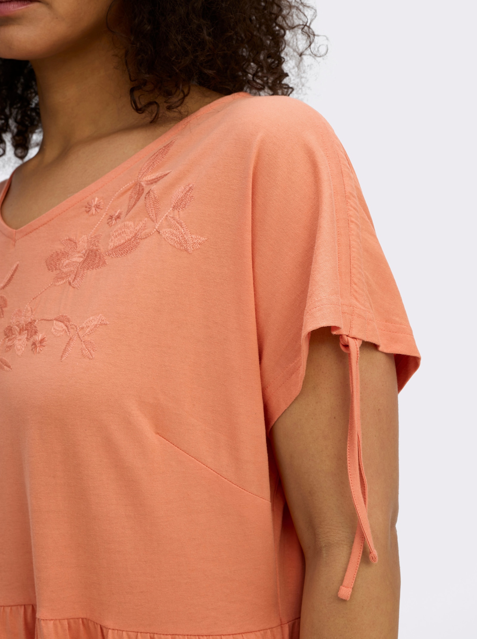 sheego Jerseyjurk met bloemenborduursel - papaya