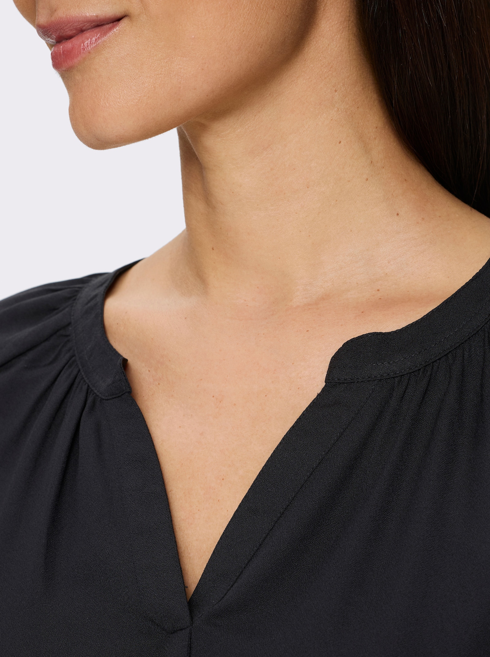 heine Schlupfbluse mit Schriftzug - schwarz-ecru