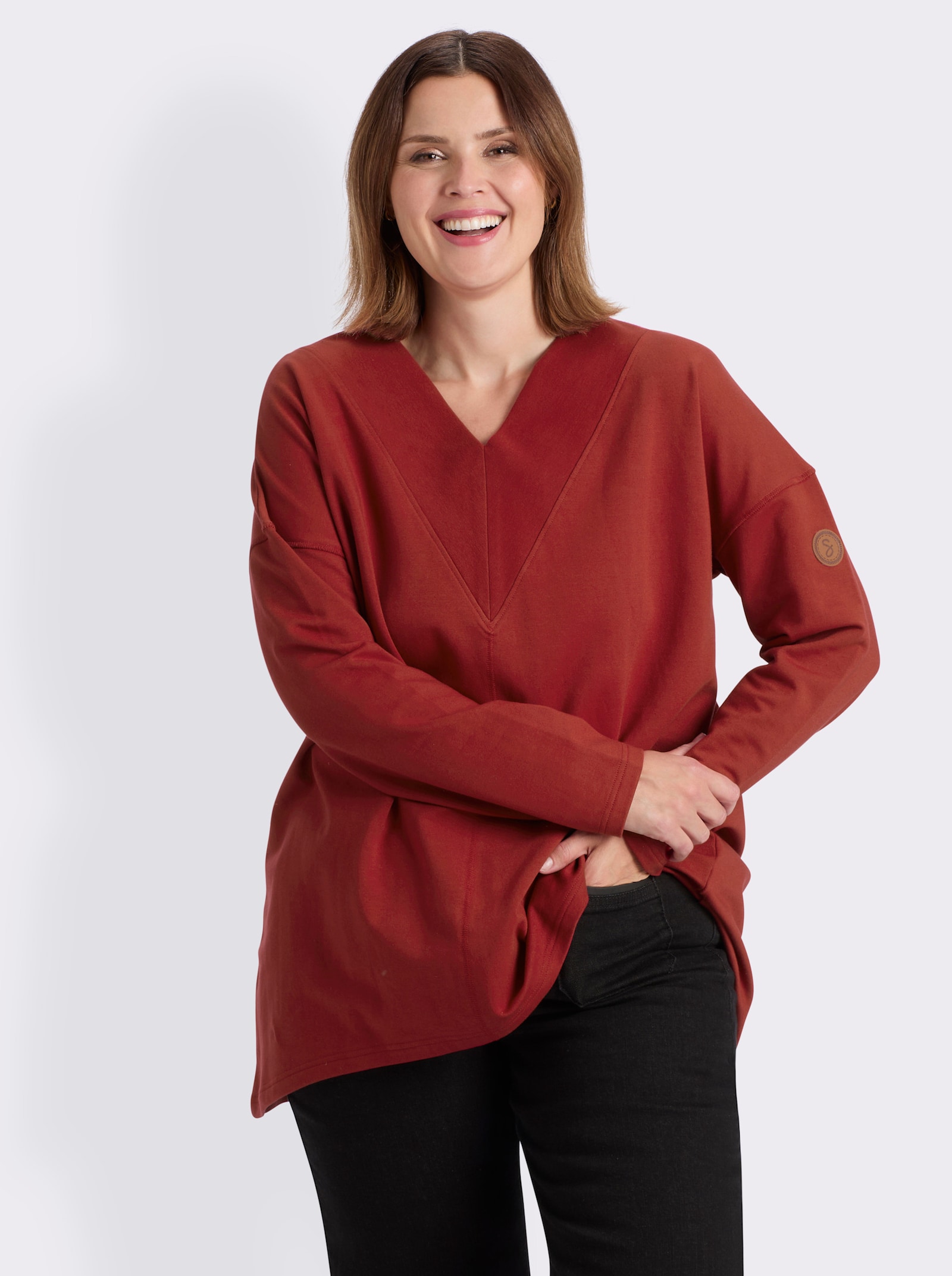 sheego Sweatshirt im schmeichelnden Vokuhila-Schnitt - kirsche