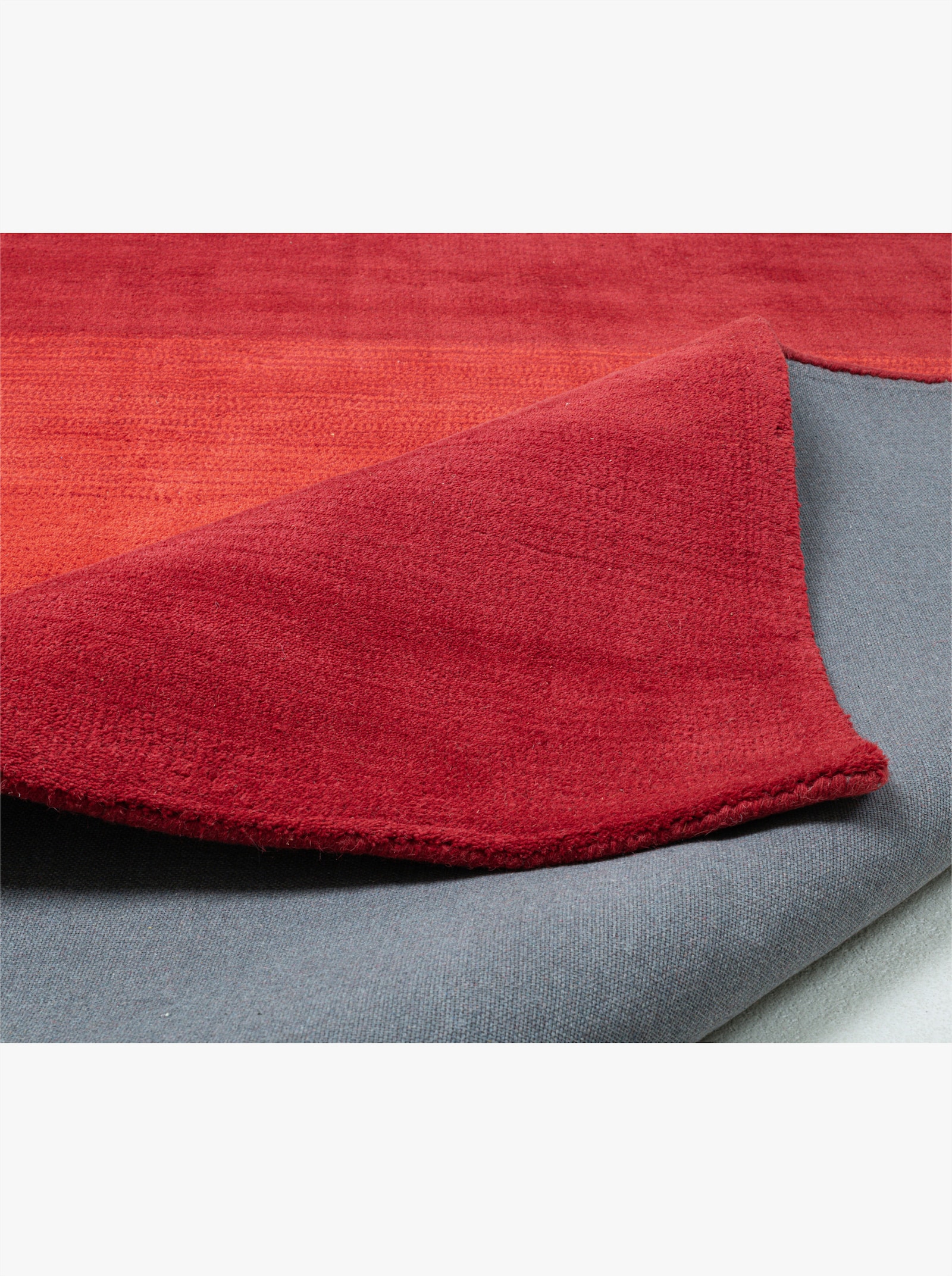 Theko Handwebteppich - rot