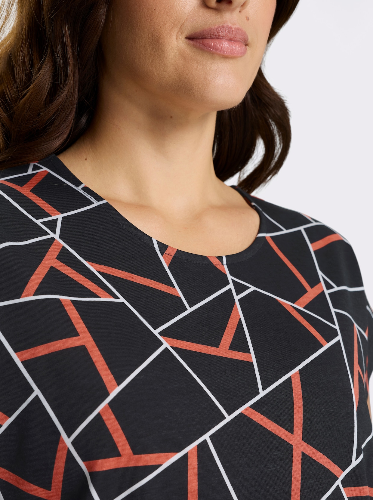 Kurzarmshirt mit Grafik-Print vorne - schwarz-papaya-bedruckt