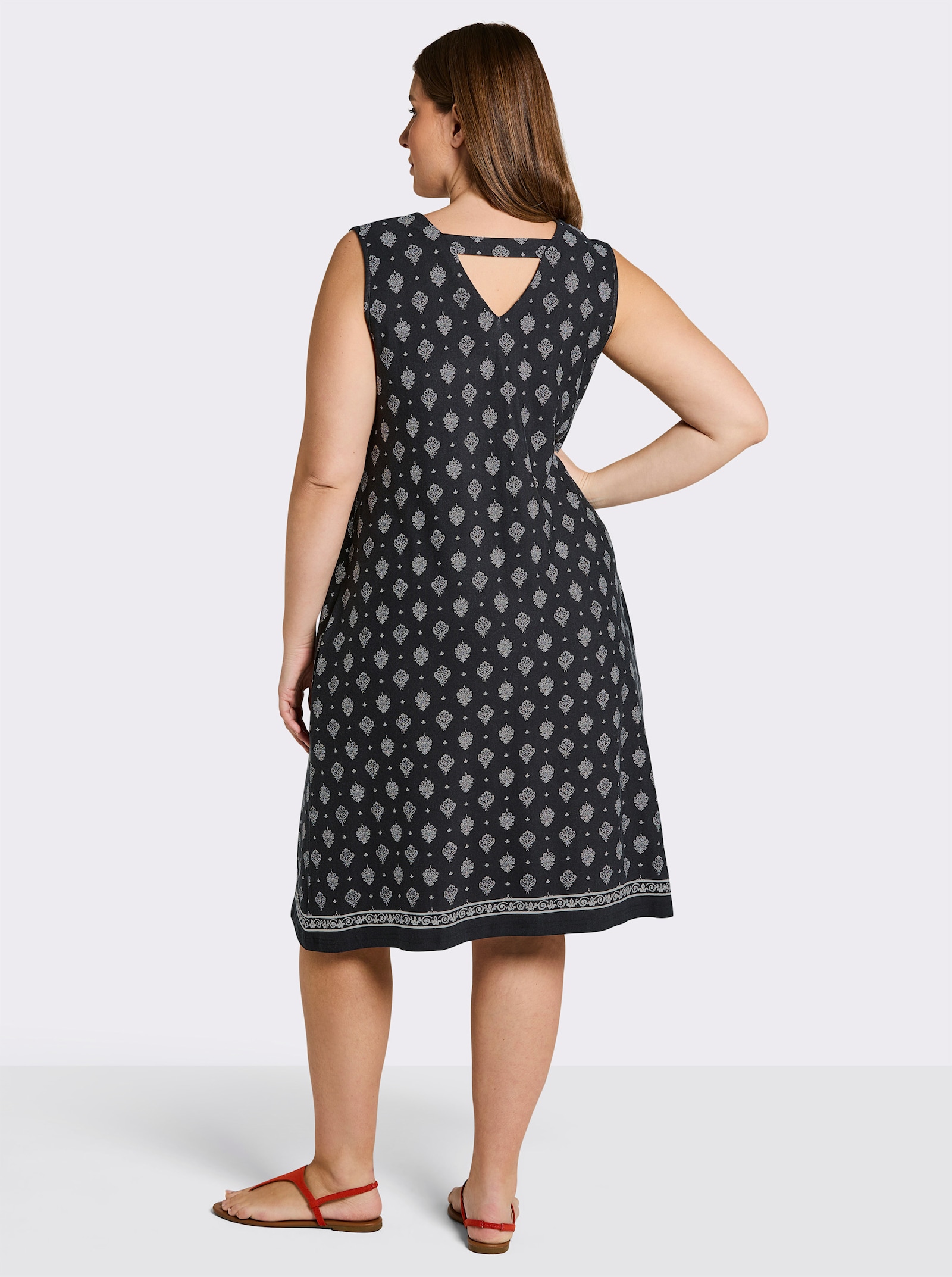 sheego Jerseykleid mit Ornamentprint, in A-Linie - schwarz-ecru-bedruckt