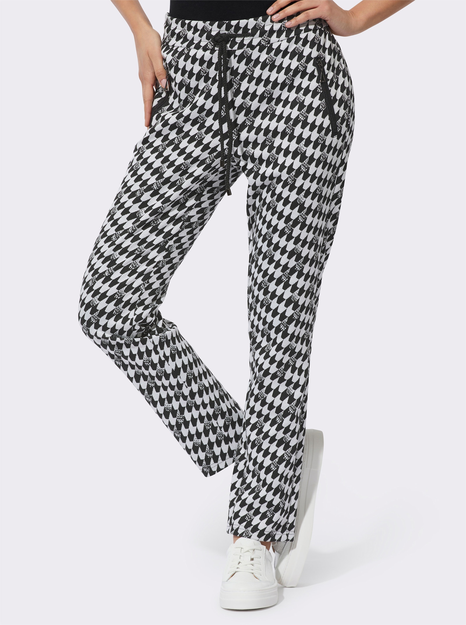 Pantalon en jersey avec motif jacquard contrasté - noir-blanc à motifs