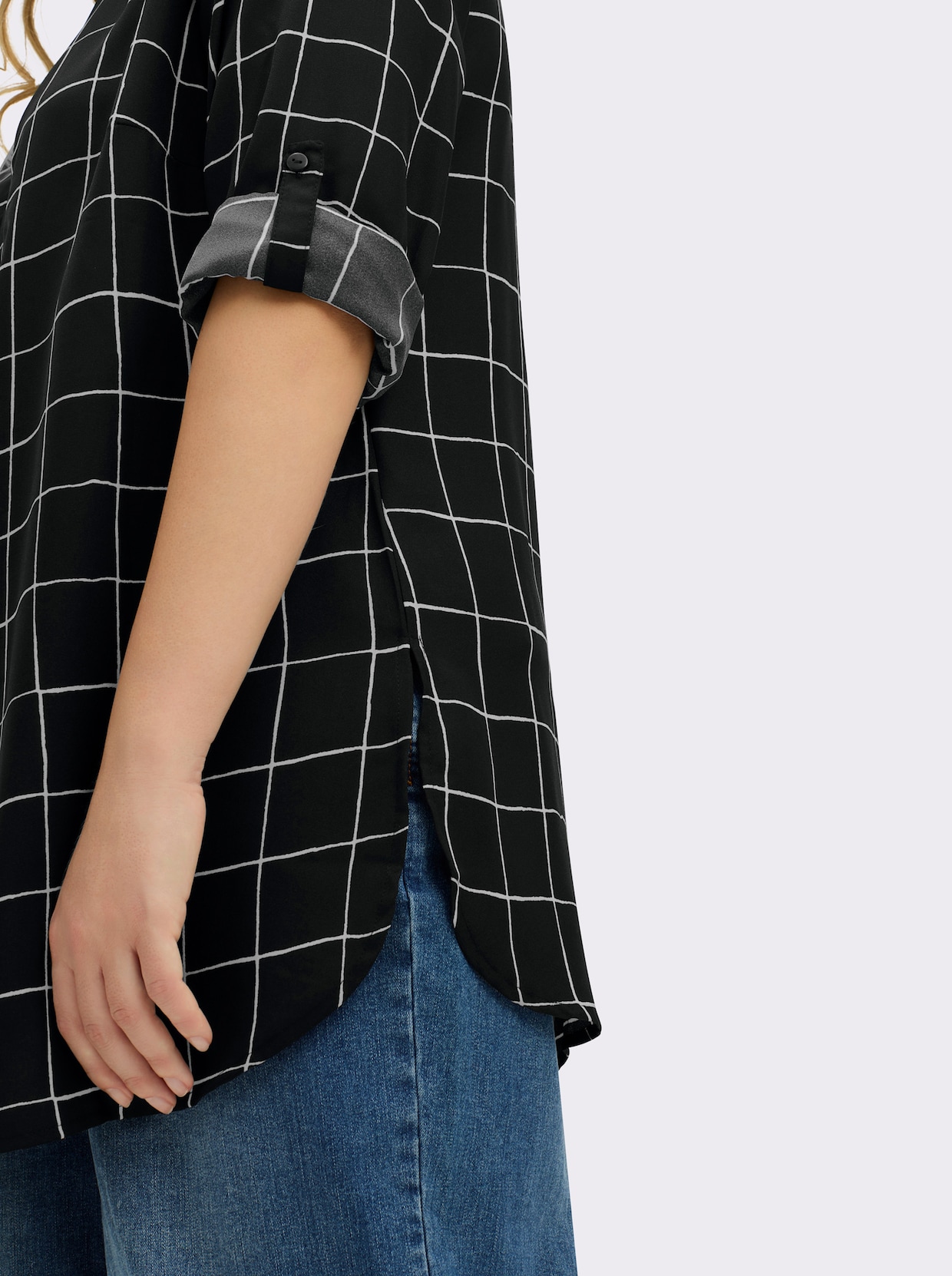 Langarm-Bluse in Longform - schwarz-weiß-kariert