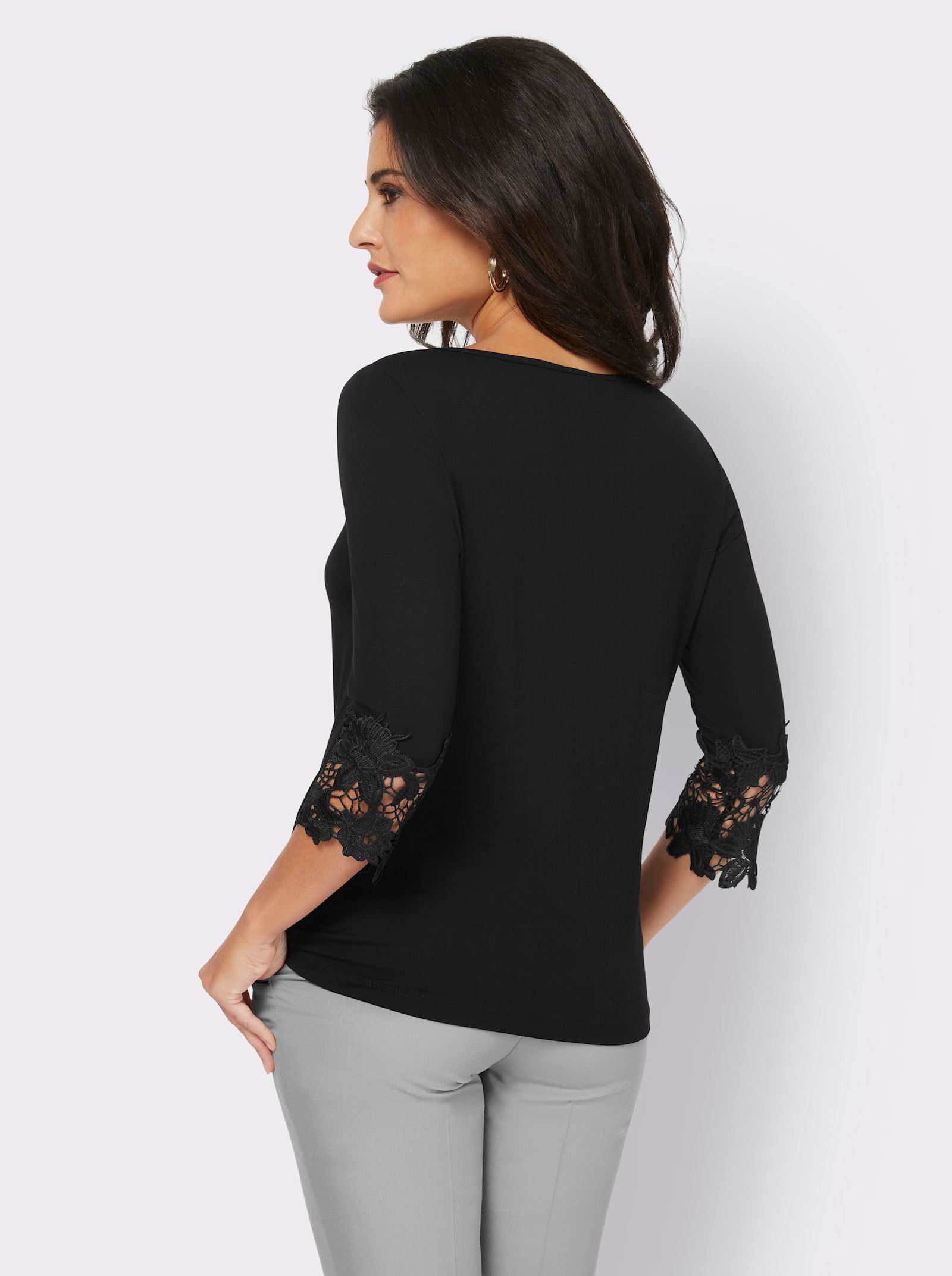 Rundhalsshirt mit Spitzenabschluss - schwarz