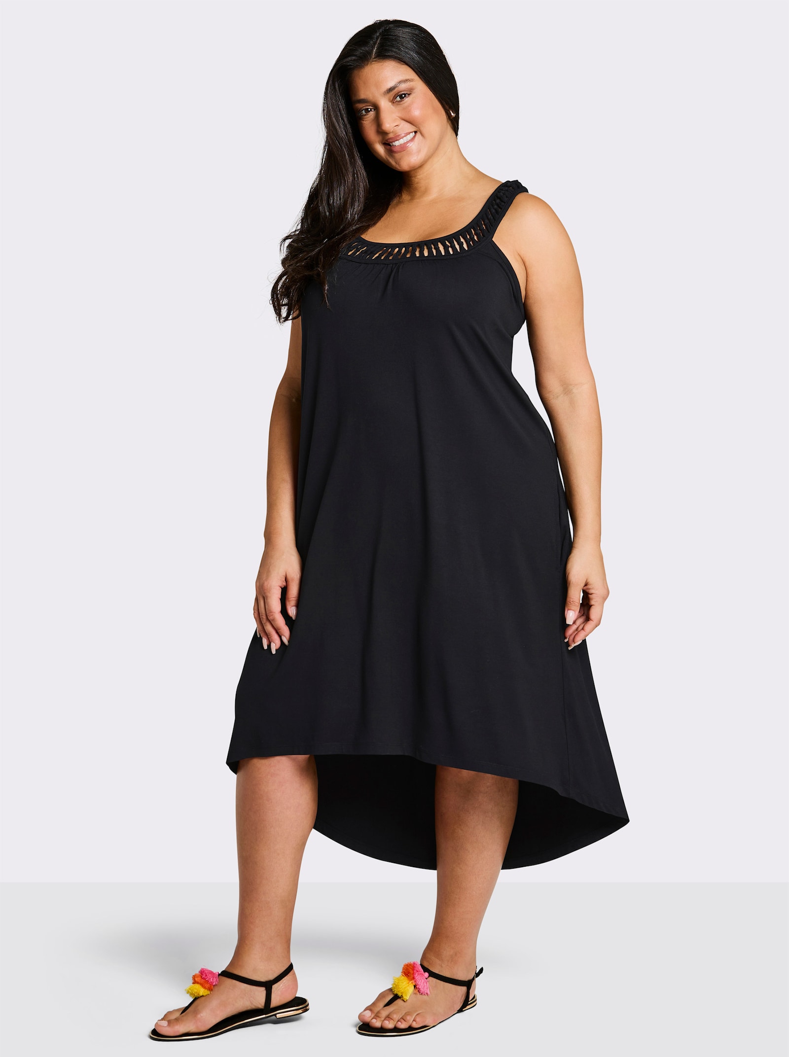 sheego Jerseyjurk met geraffineerde hals - zwart