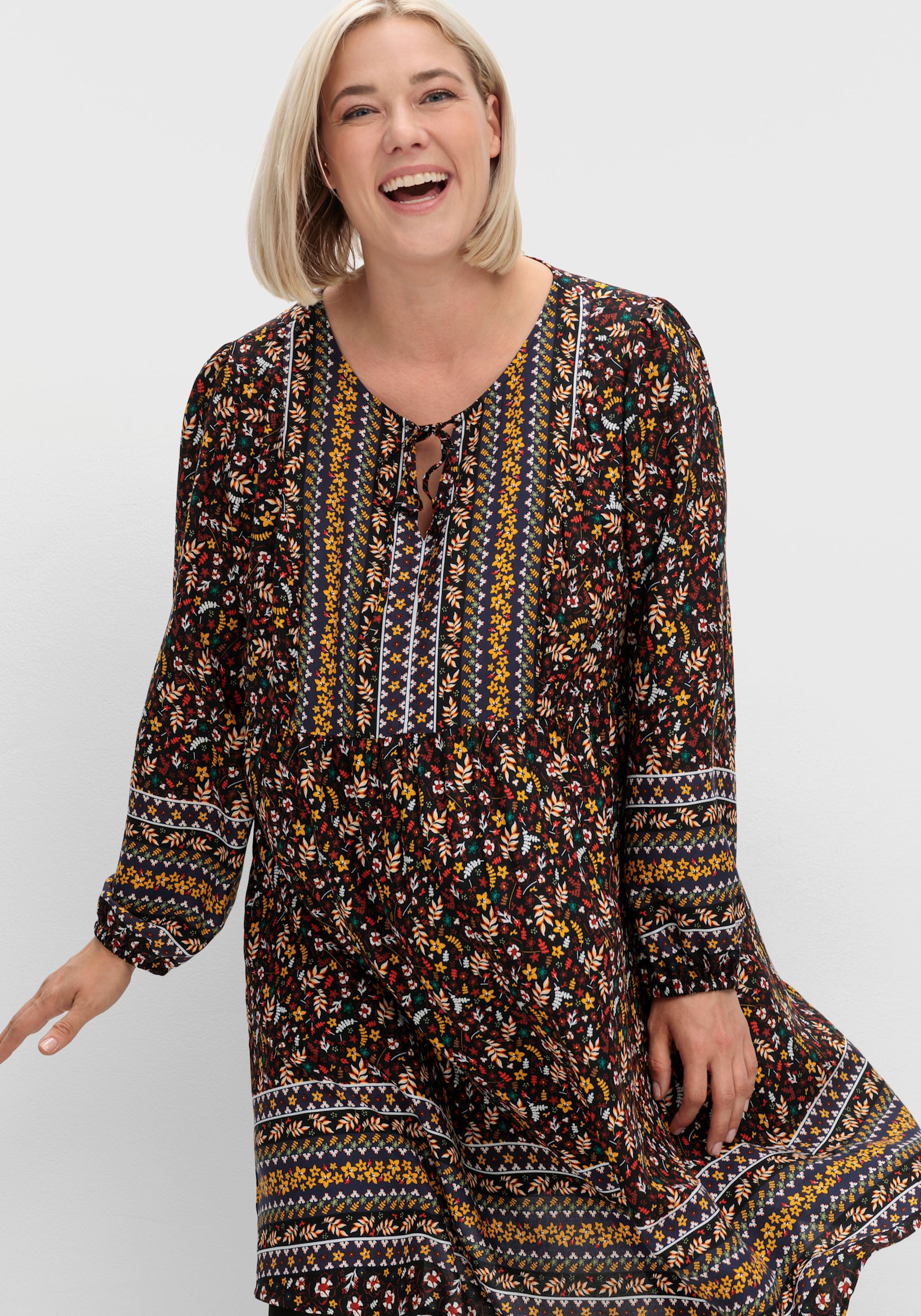 Druckkleid mit Bordüren-Dessin - schwarz-rotbraun-bedruckt