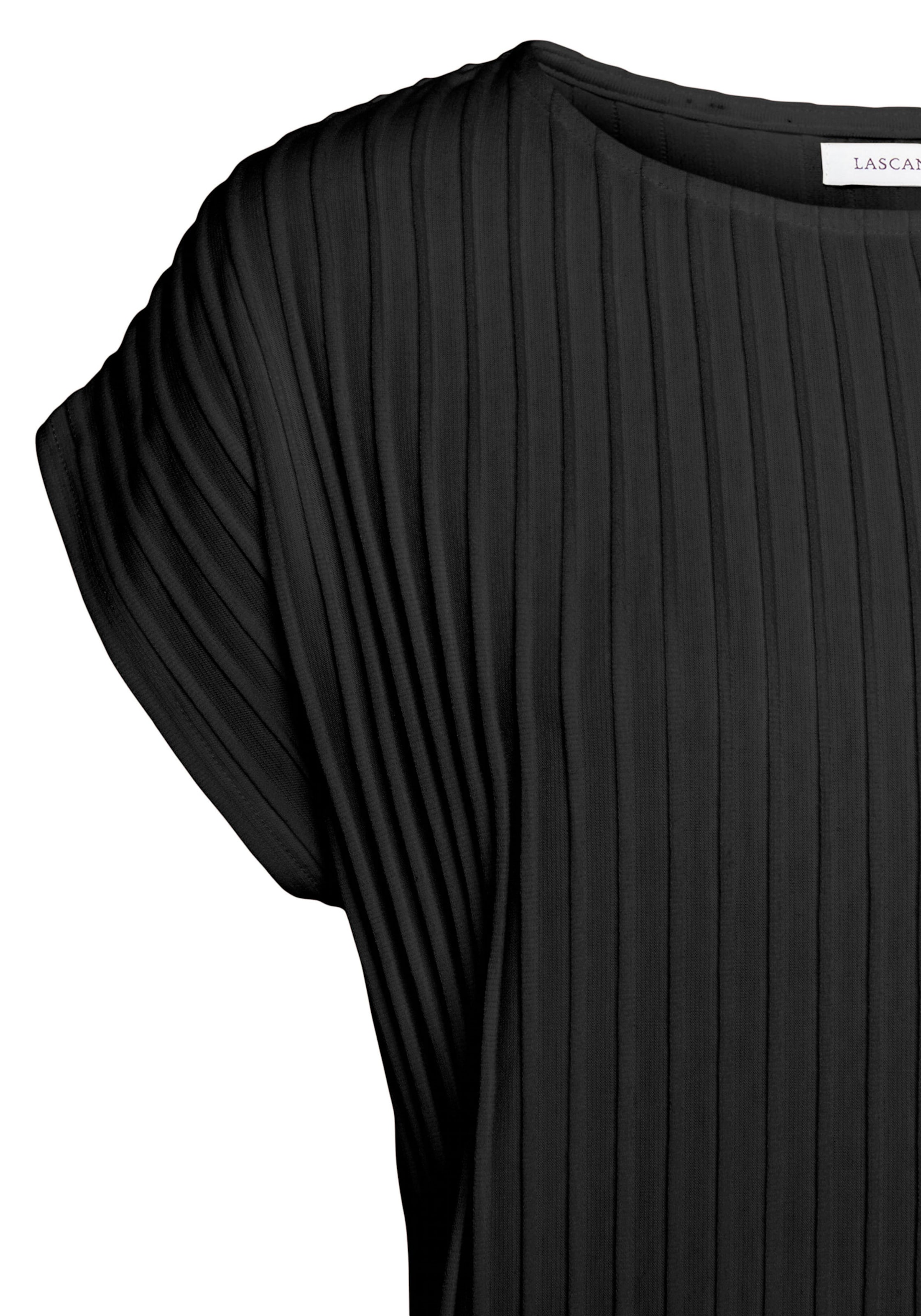 Shirt Kurzarm günstig Kaufen-Kurzarmshirt in schwarz von LASCANA. Kurzarmshirt in schwarz von LASCANA <![CDATA[Shirt von Lascana. Runder Halsausschnitt, Kurze überschnittene Ärmel. Gerader Saumabschluss. Lockere Passform. Aus weicher Strukturware.]]>. 
