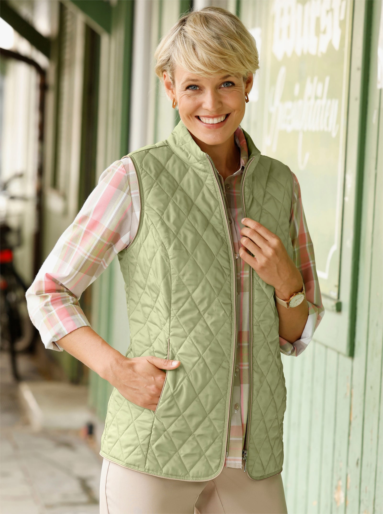 Bodywarmer met contrastpaspels - lindegroen