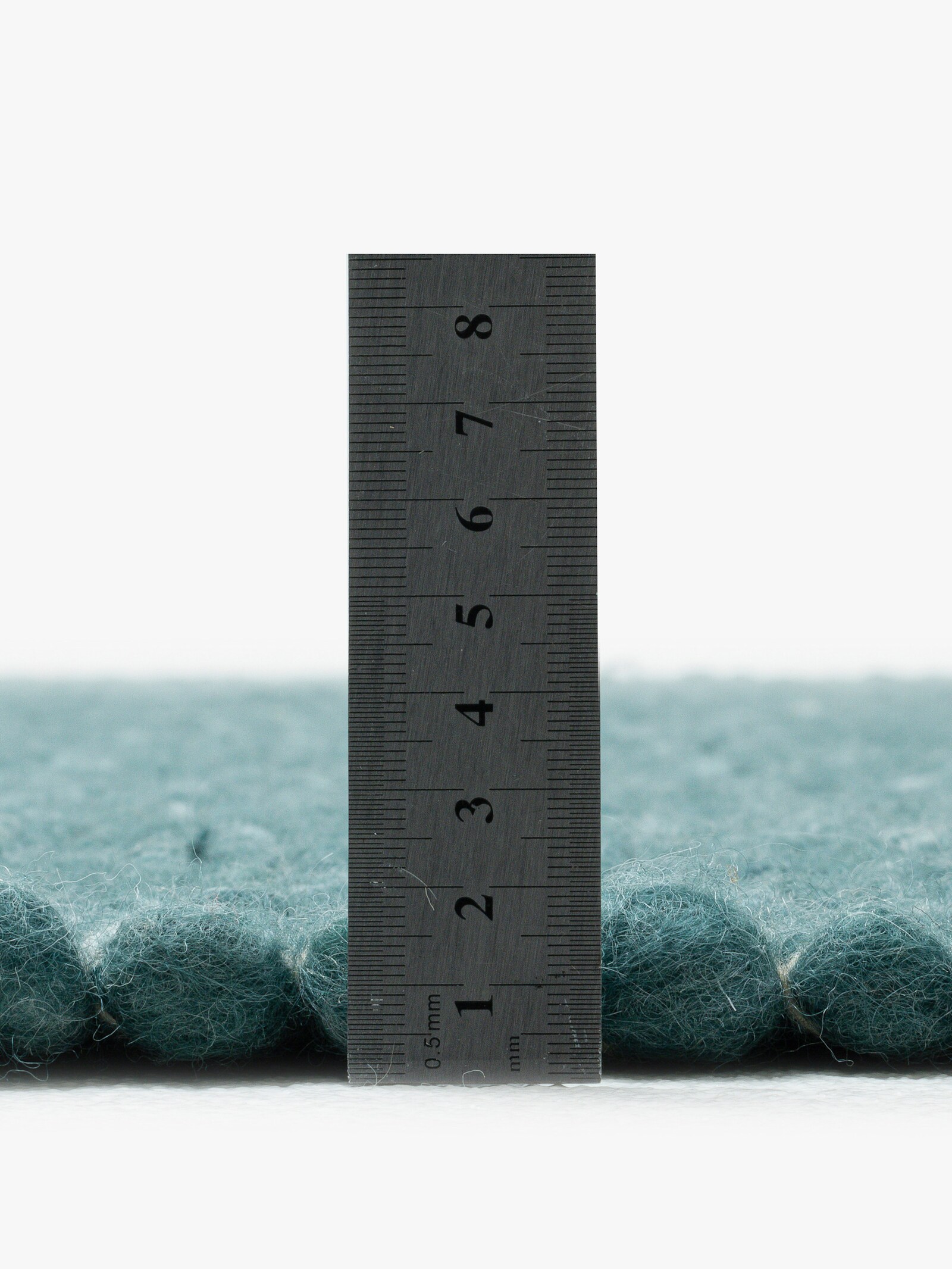 Theko Handwebteppich - petrol