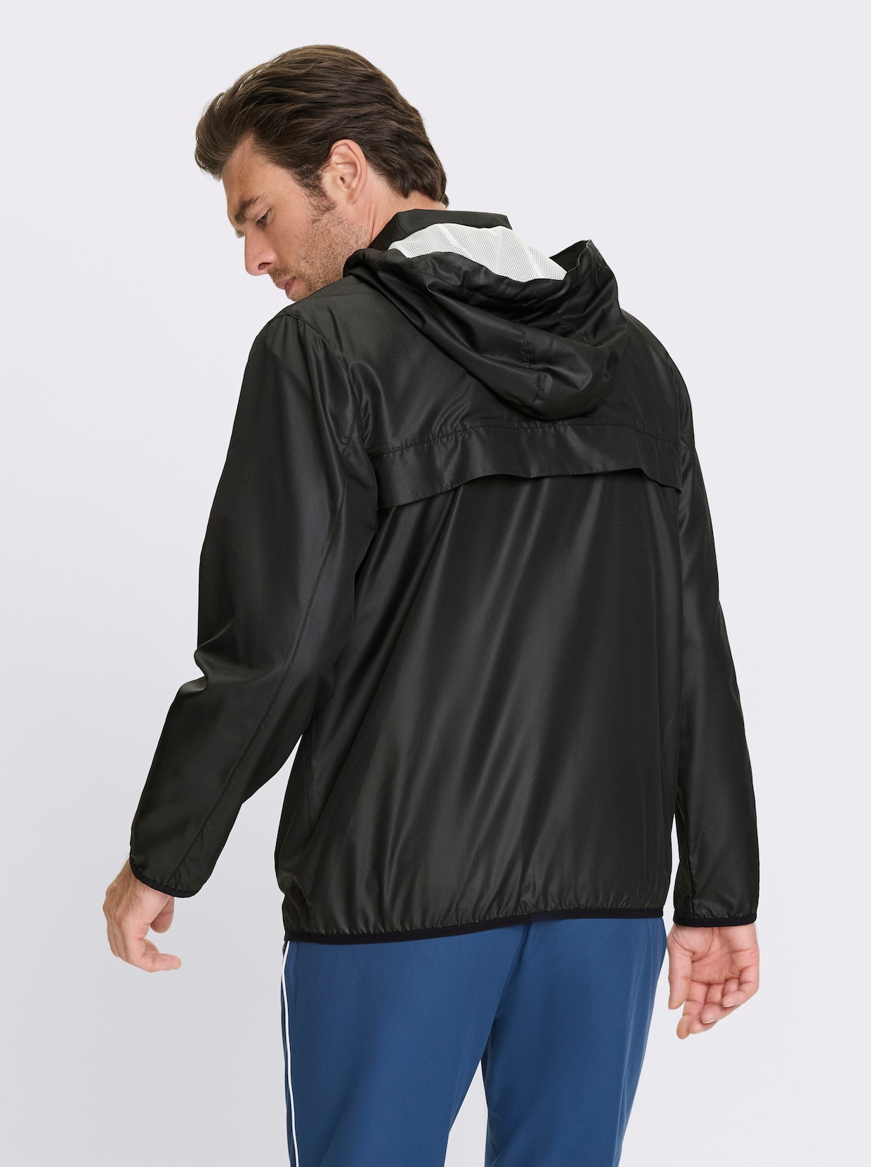 Catamaran Sports Funktionsjacke mit Belüftungsschlitzen hinten - schwarz