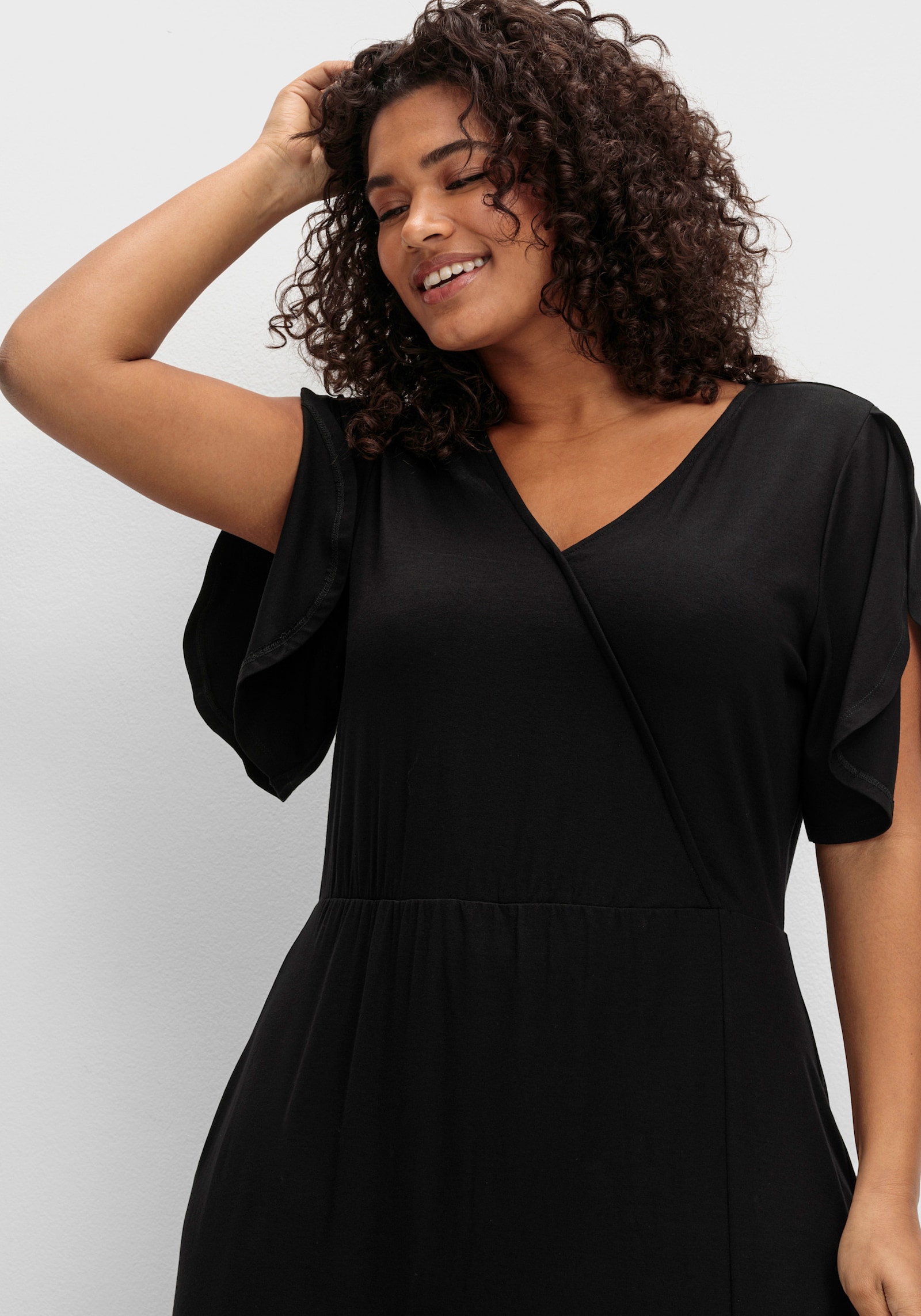 sheego Jerseyjurk in wikkellook, met volantrok - zwart