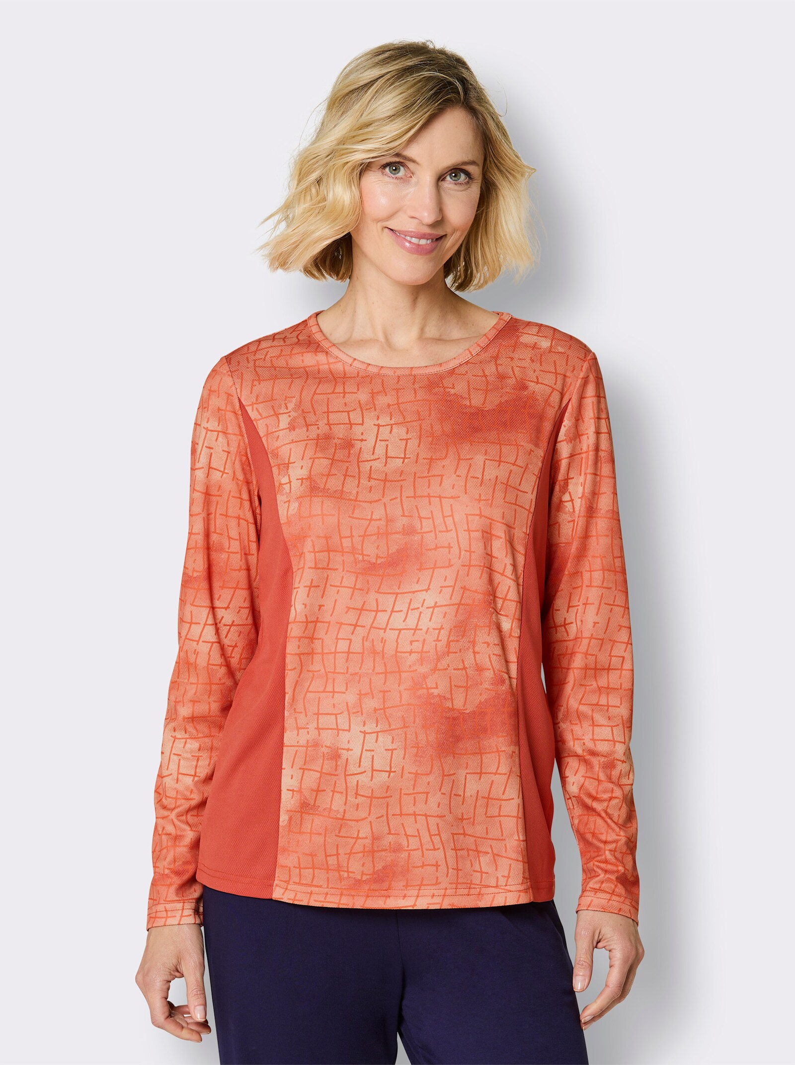 Funktionsshirt mit einfarbigen Seitenpartien - orange-gemustert