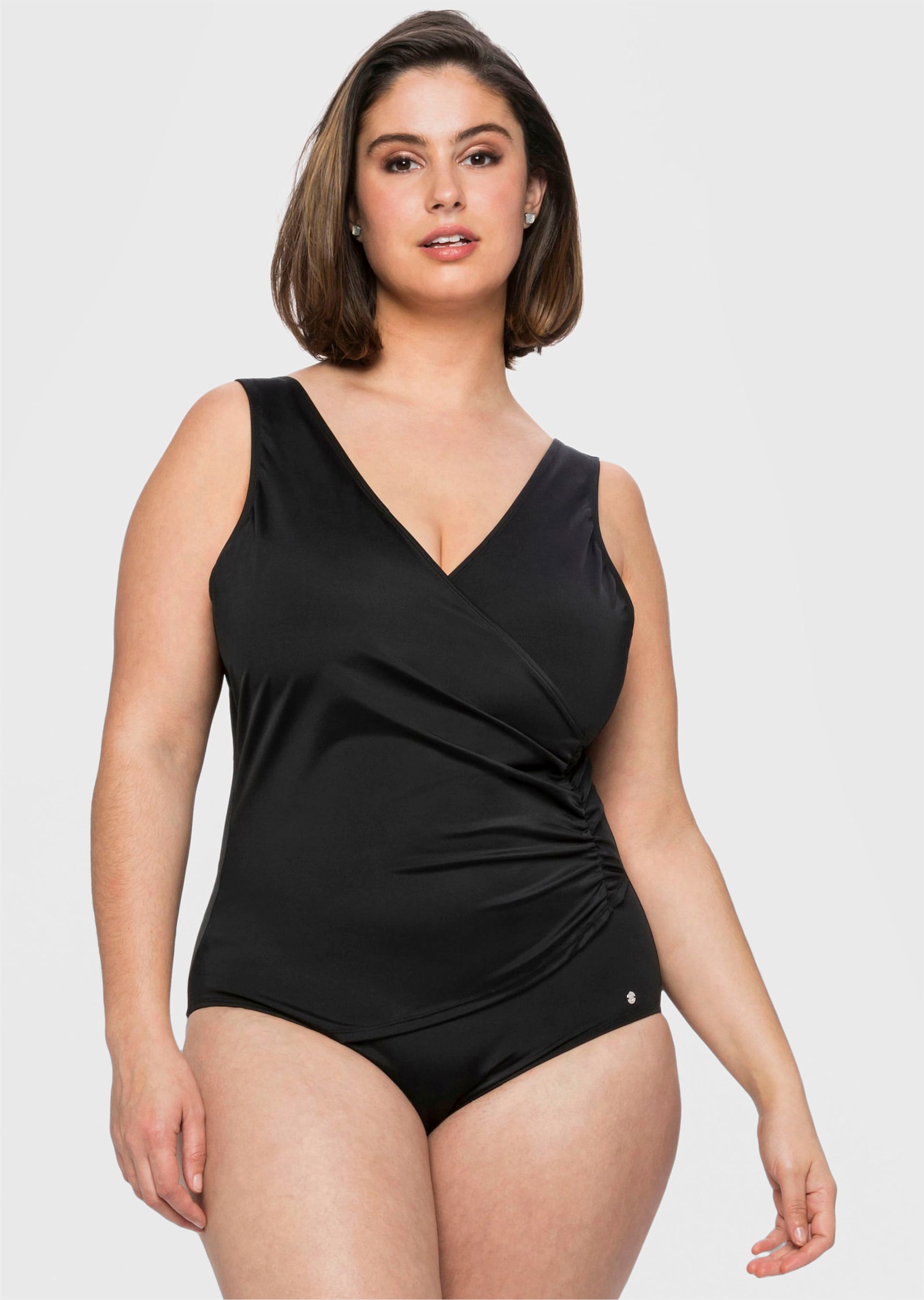 sheego Badeanzug in Wickeloptik - schwarz