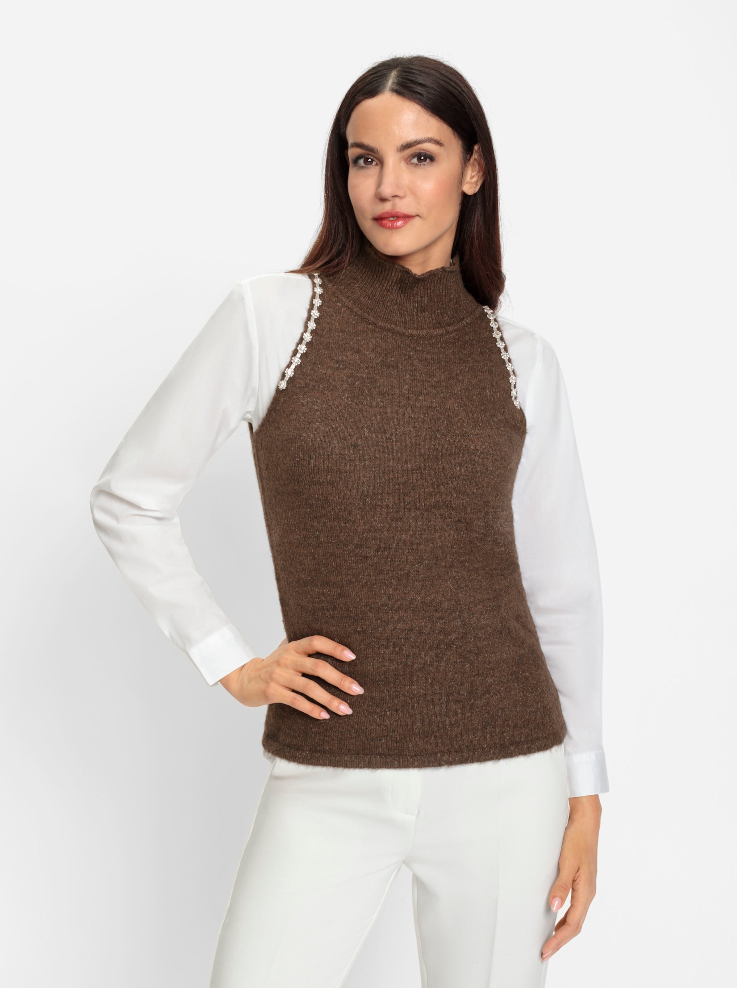 aus dem günstig Kaufen-Stricktop in braun von heine. Stricktop in braun von heine <![CDATA[Stricktop Topmodischer, ärmelloser Style mit schmeichelndem Stehkragen und Schmucksteinchen am Armausschnitt.]]>. 