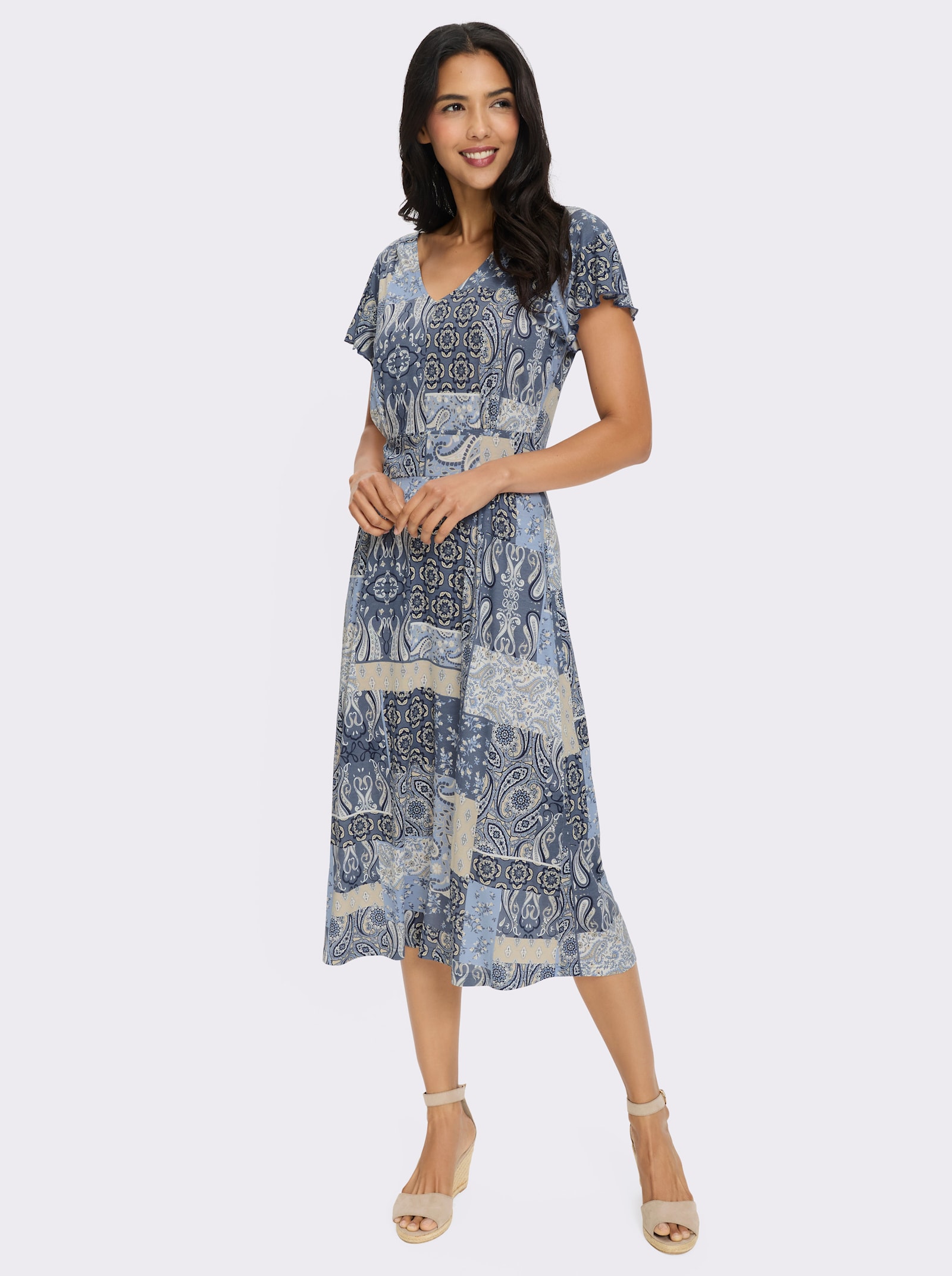Jerseykleid mit ausgestelltem Rockteil - bleu-sand-bedruckt