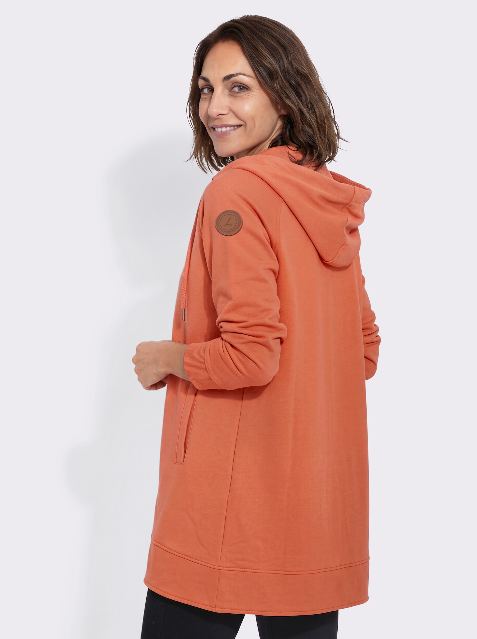 Sweatjacke mit Leistentaschen - papaya