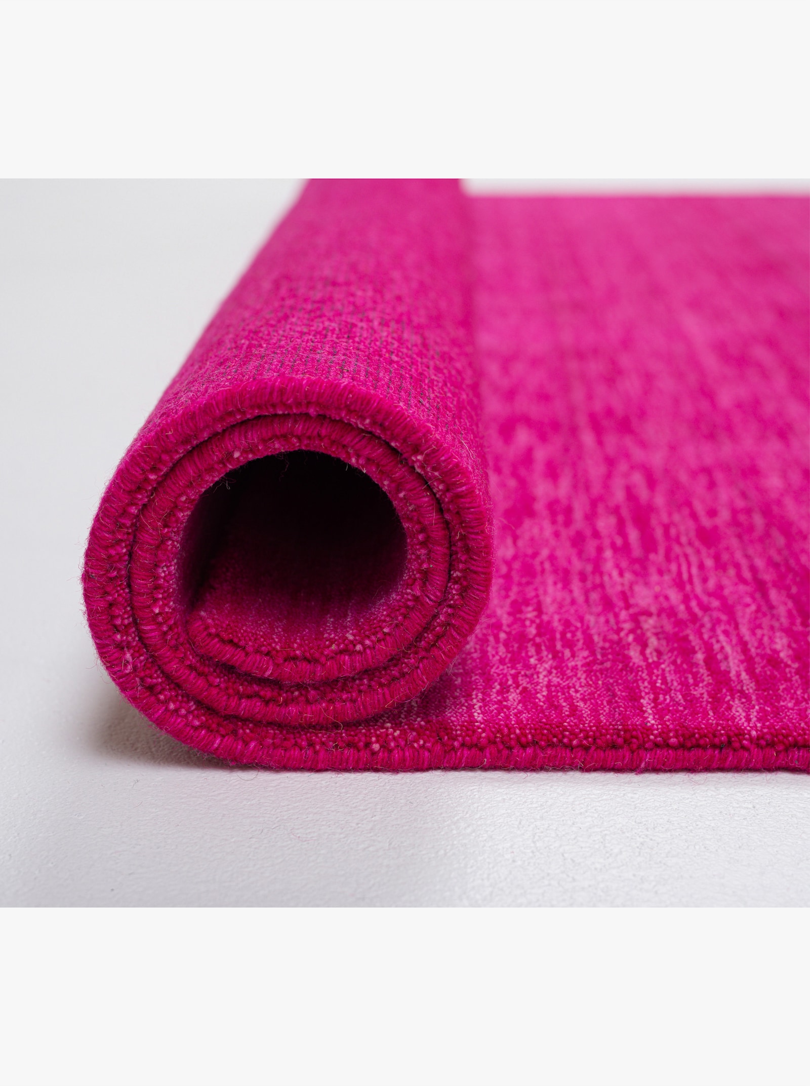 Theko Handwebteppich - pink