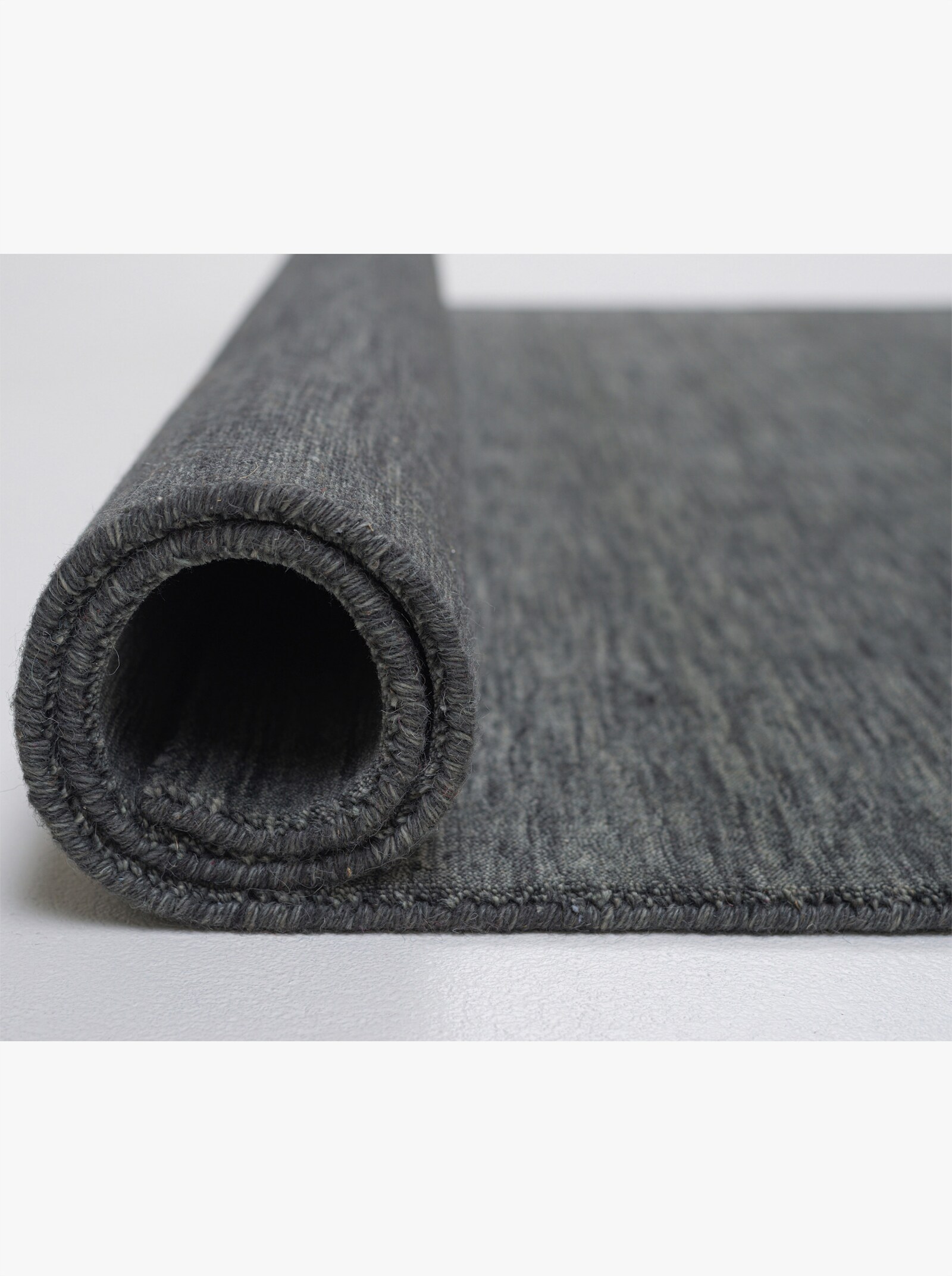 Theko Handwebteppich - anthrazit