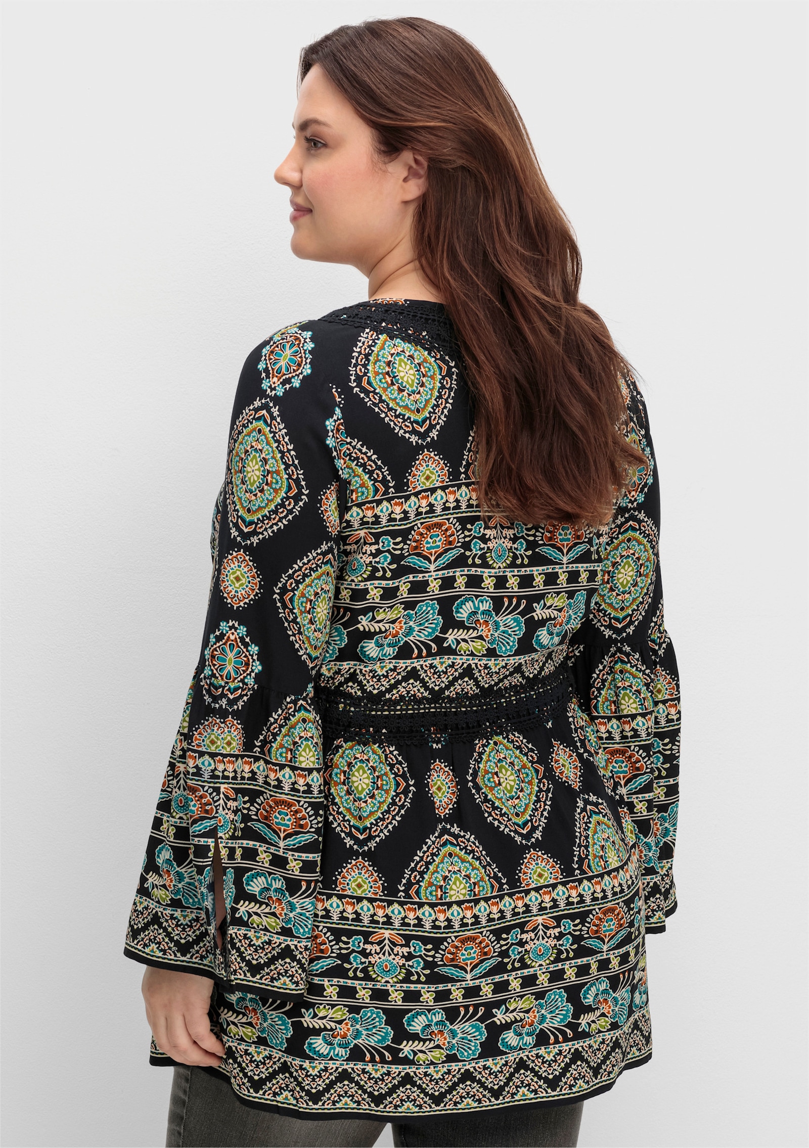 sheego by Joe Browns Longbluse mit Trompetenärmeln - schwarz-gemustert