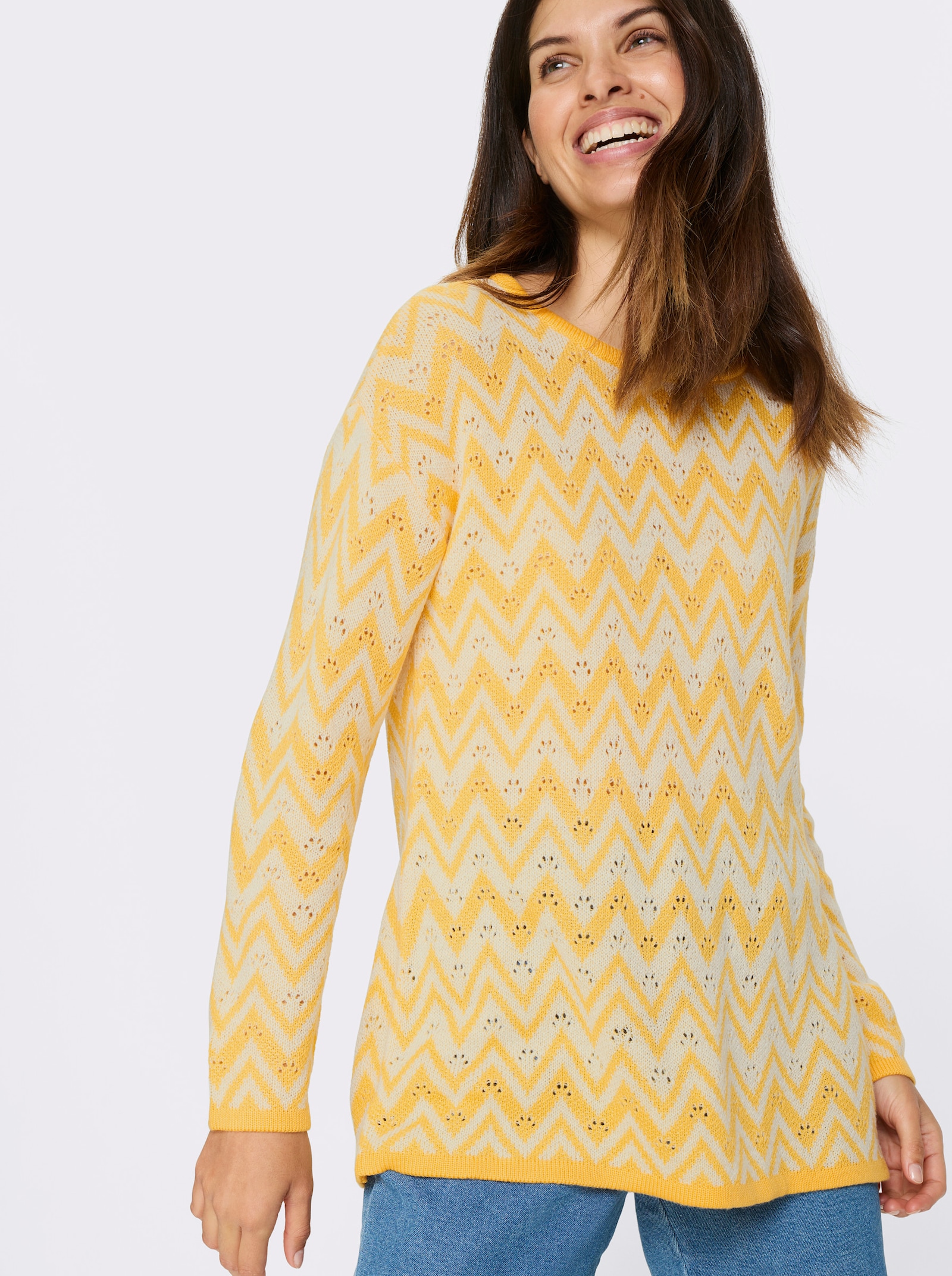 Lange pullover met zigzag- en ajourpatroon - geel/wit gedessineerd