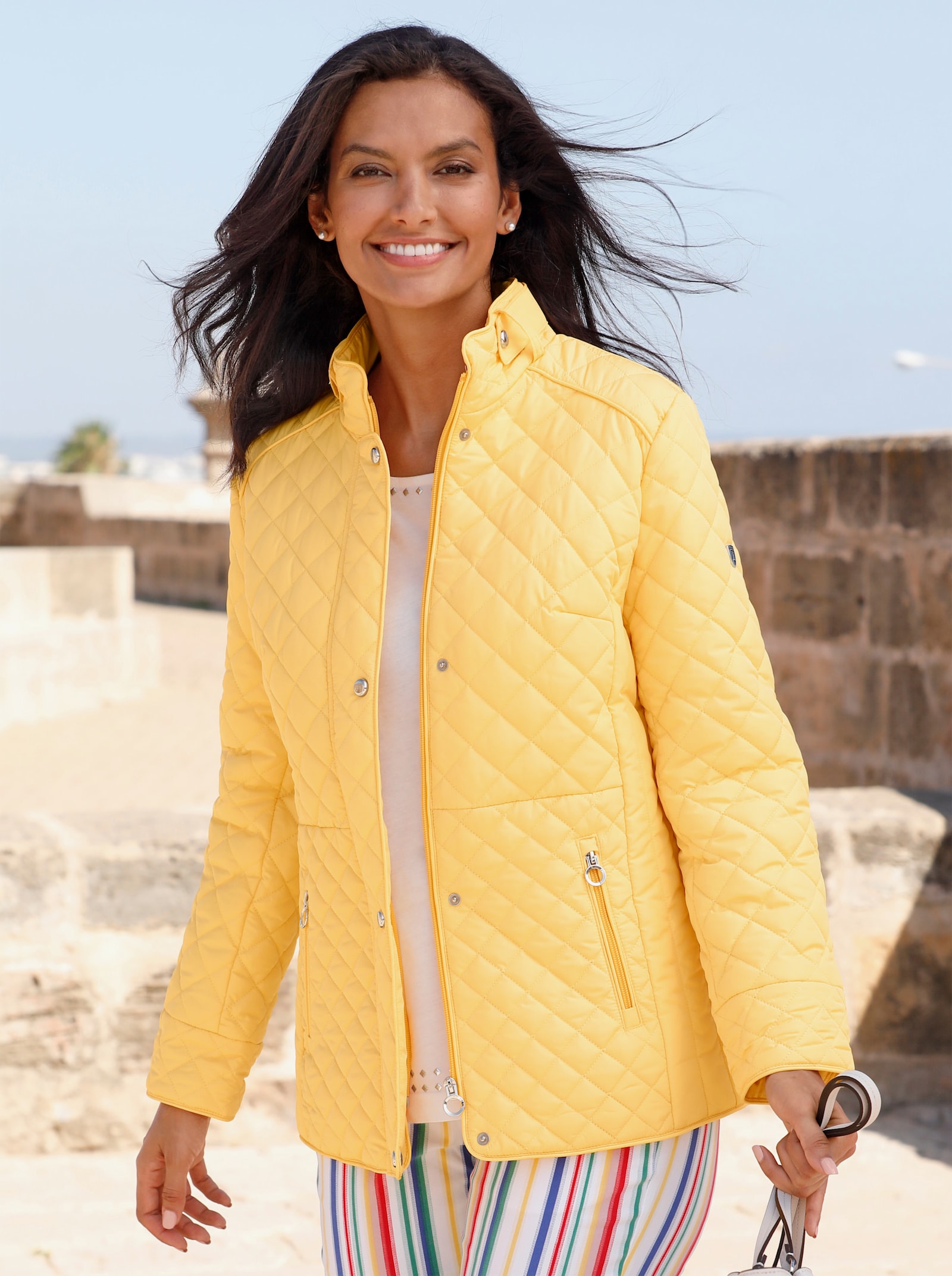 Steppjacke mit knöpfbarer Innentasche - gelb