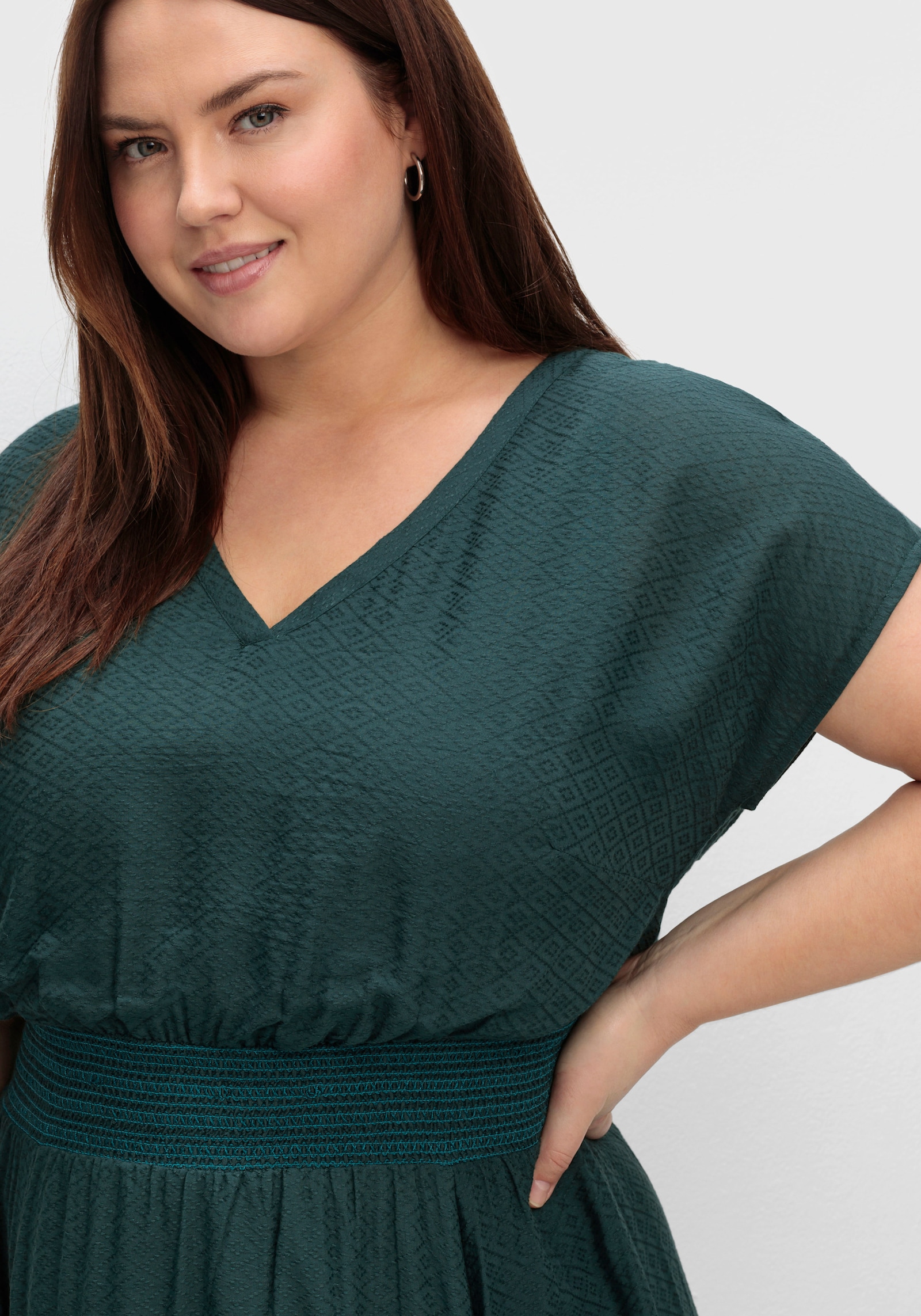 sheego Maxikleid mit Smokbund und Volant am Saum - tiefgrün