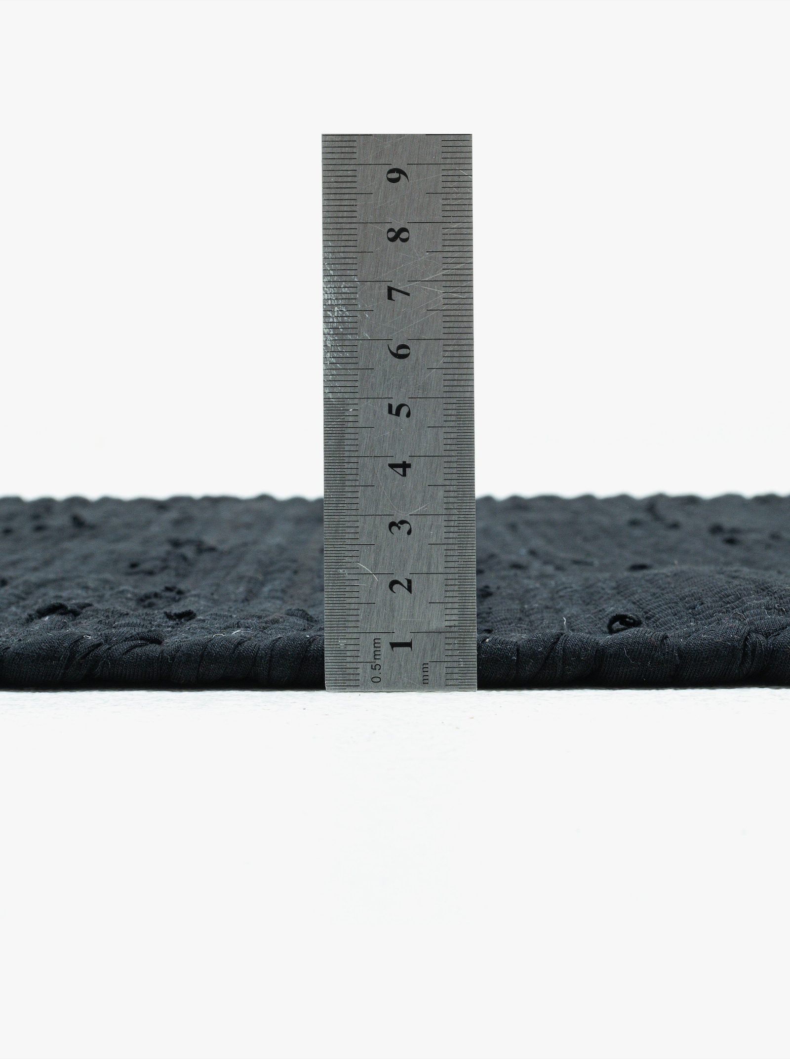 Theko Handwebteppich - schwarz