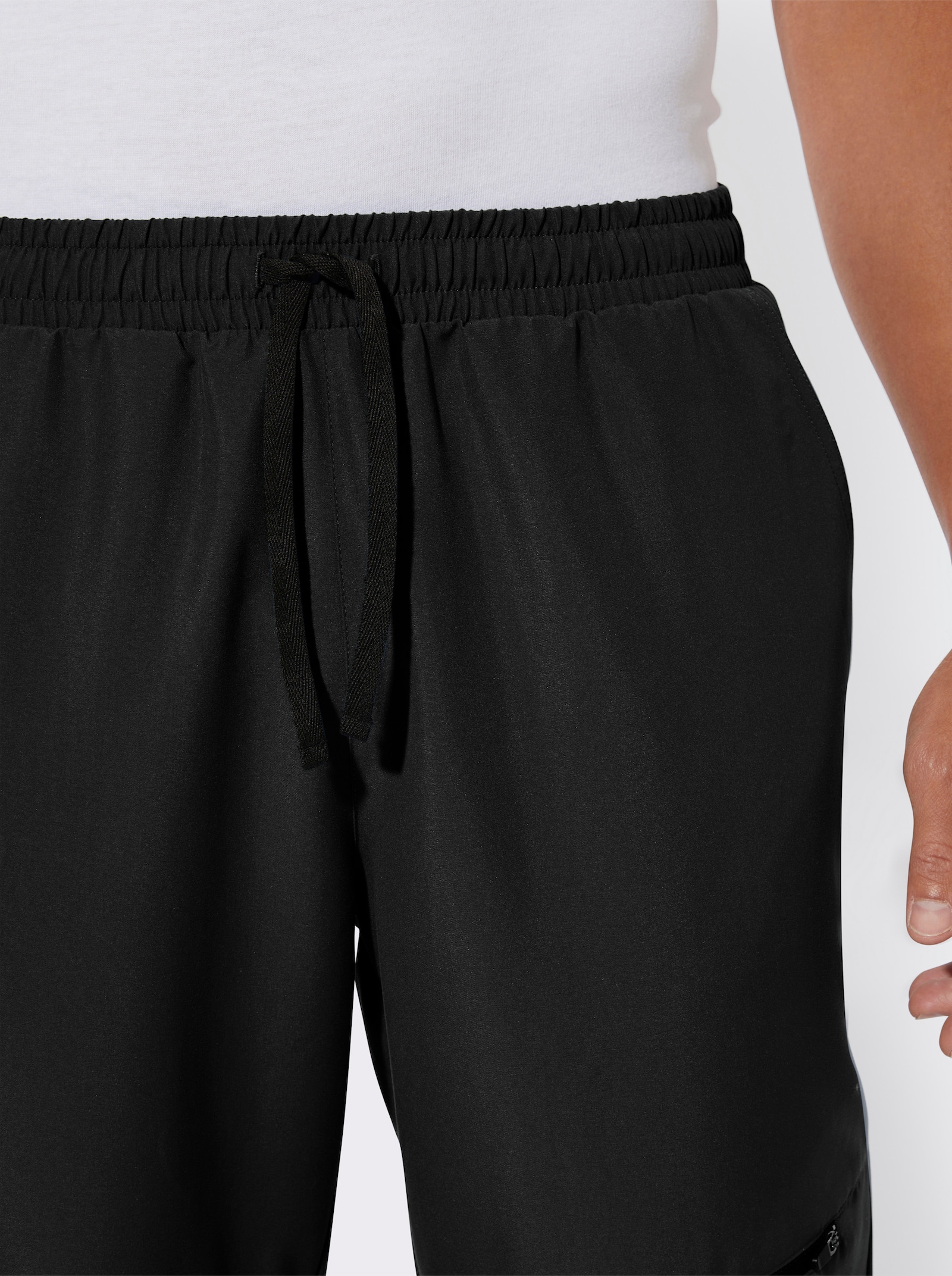Kalhoty pro volný čas s kapsou na zip - černá