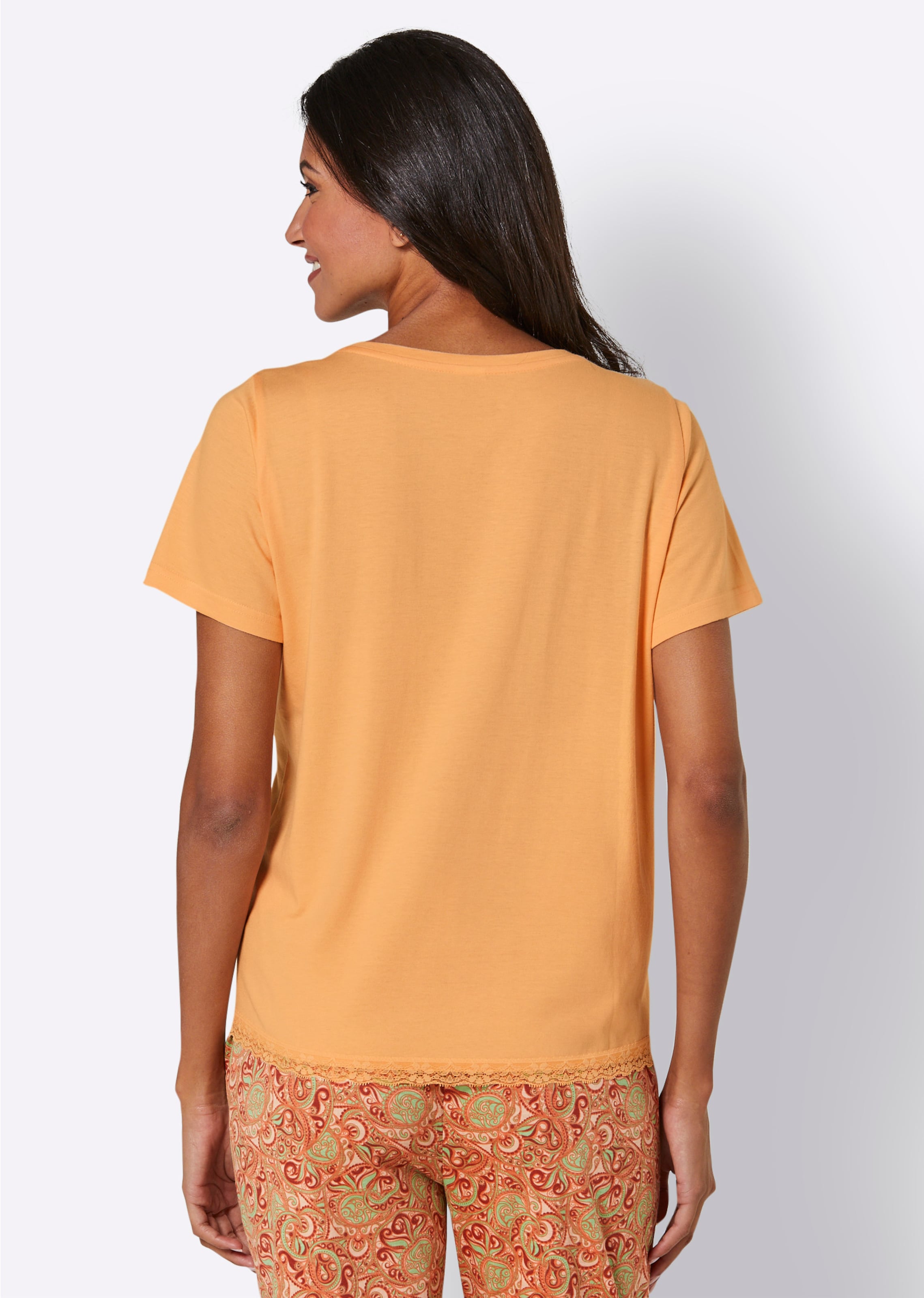 Zarte günstig Kaufen-Schlafanzug-Shirt in apricot von wäschepur. Schlafanzug-Shirt in apricot von wäschepur <![CDATA[Die zarte Spitze am Saum schenkt diesem kombifreudigen Schlafanzug-Shirt einen Hauch Eleganz. Aus herrlich weichem Single-Jersey.]]>. 