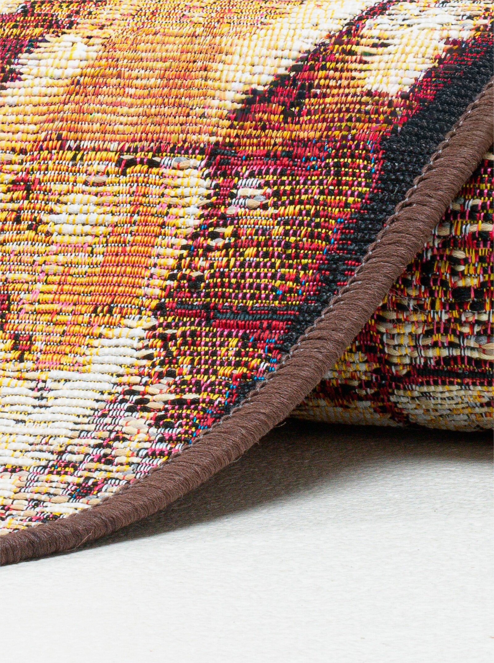 Theko Teppich - braun-gemustert