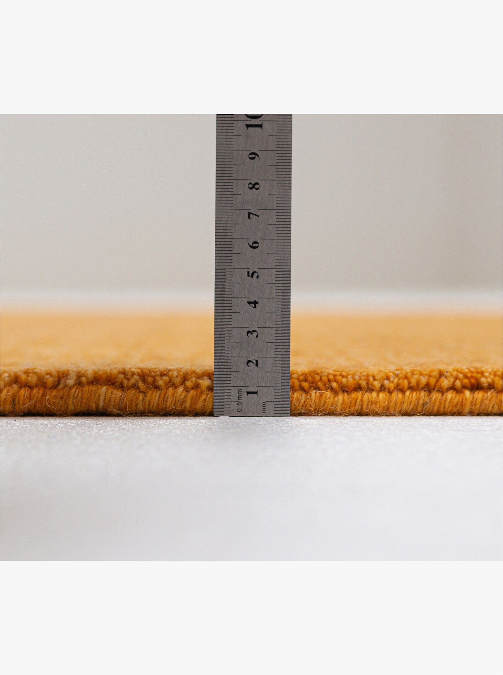 Theko Handwebteppich - gelb