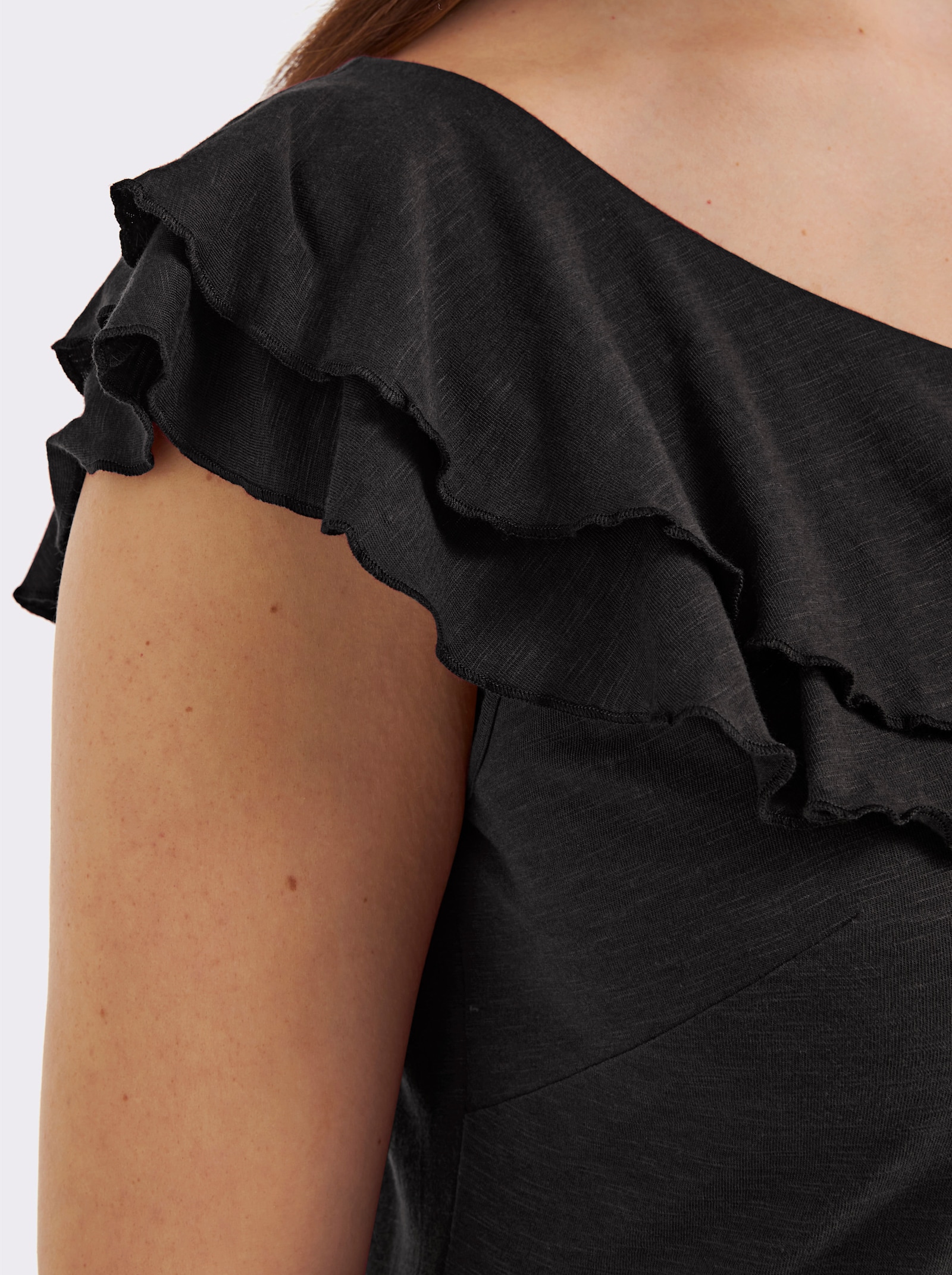 sheego Carmenshirt mit breitem Volant - schwarz